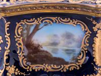 A Sèvres Style Painted and Parcel Gilt Porcelain Table Casket