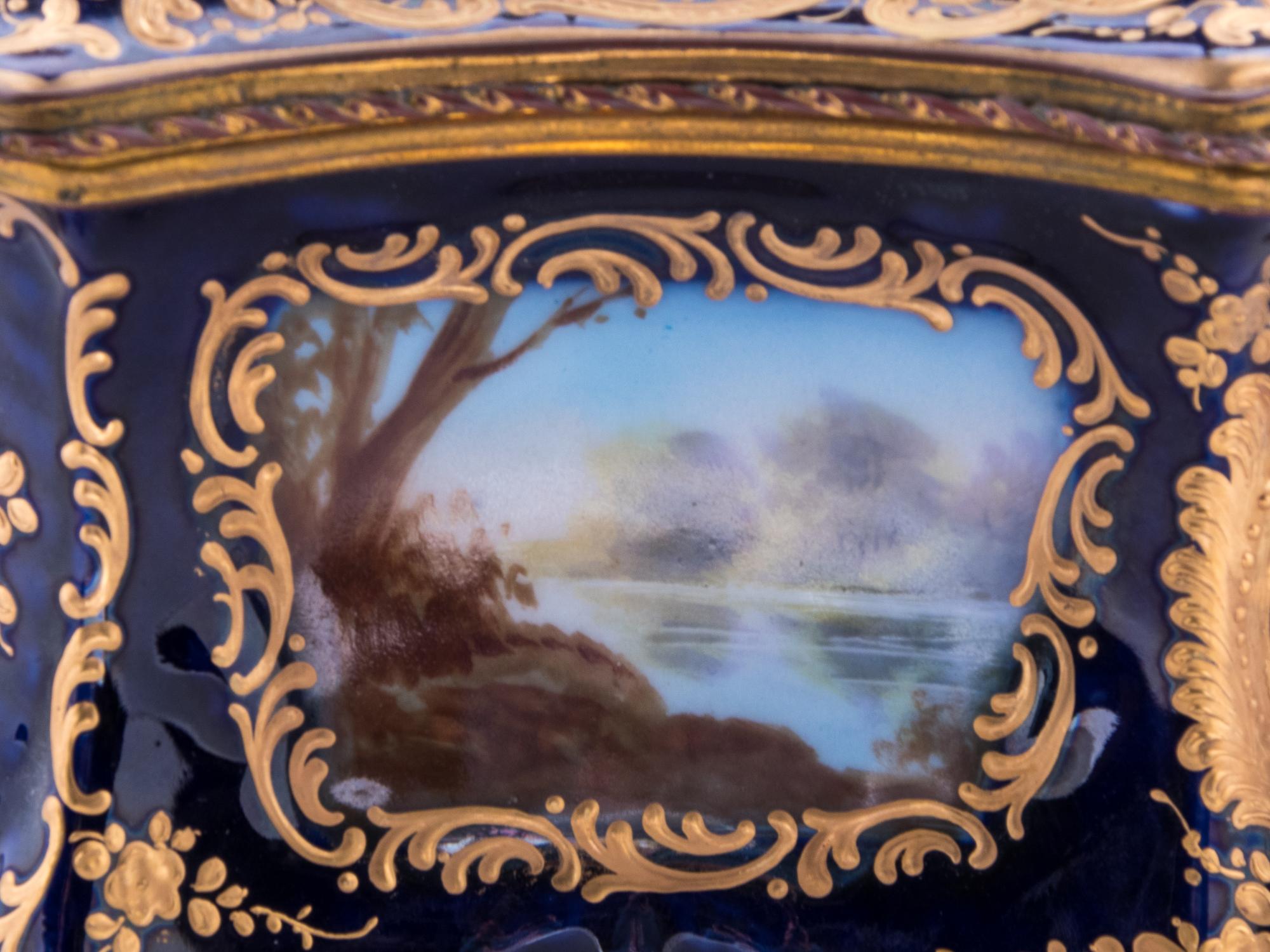 A Sèvres Style Painted and Parcel Gilt Porcelain Table Casket