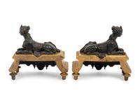 A Pair of Louis XVI Style Gilt and Patinated Bronze Chenets with Sphinxes