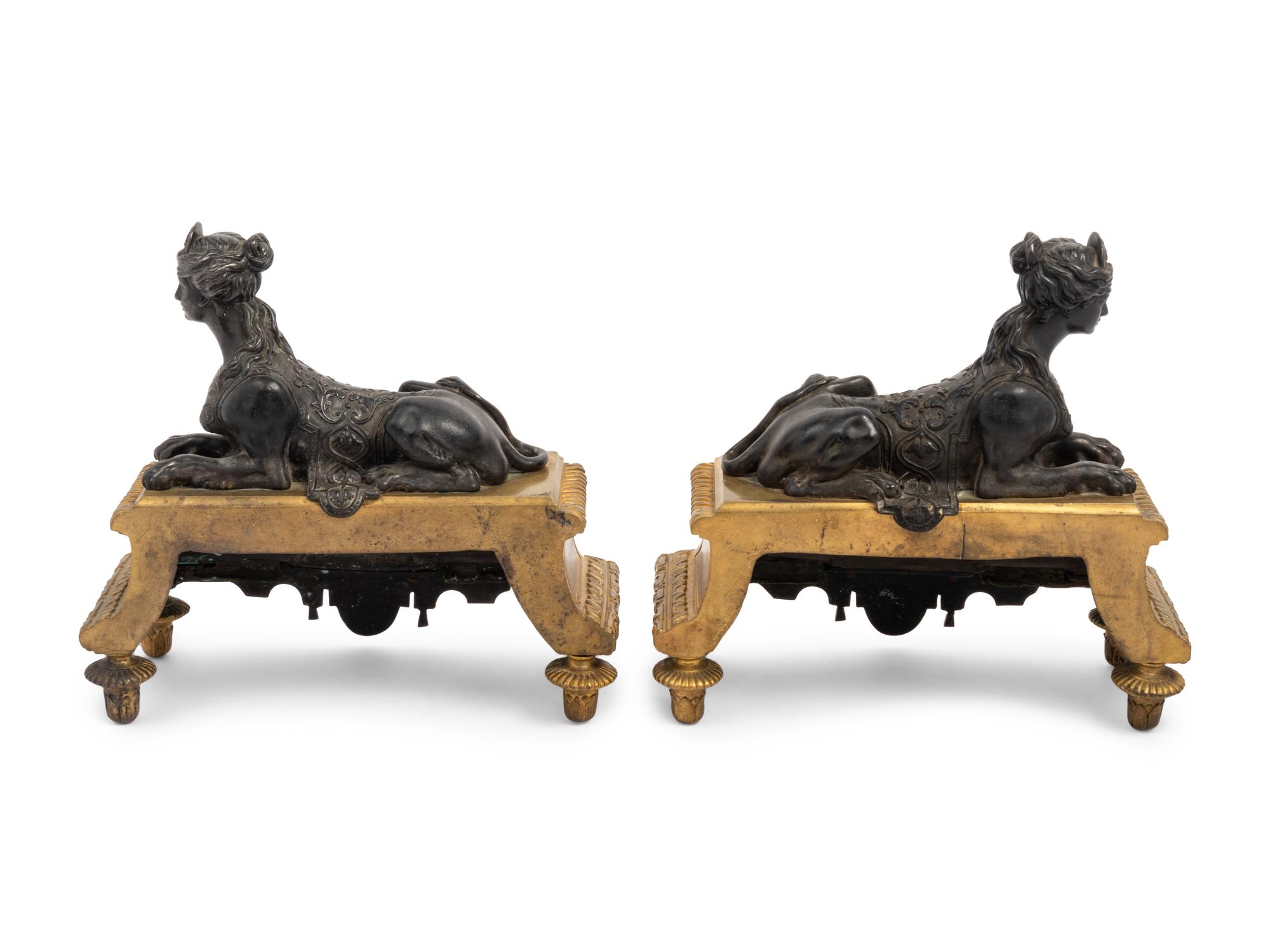 A Pair of Louis XVI Style Gilt and Patinated Bronze Chenets with Sphinxes