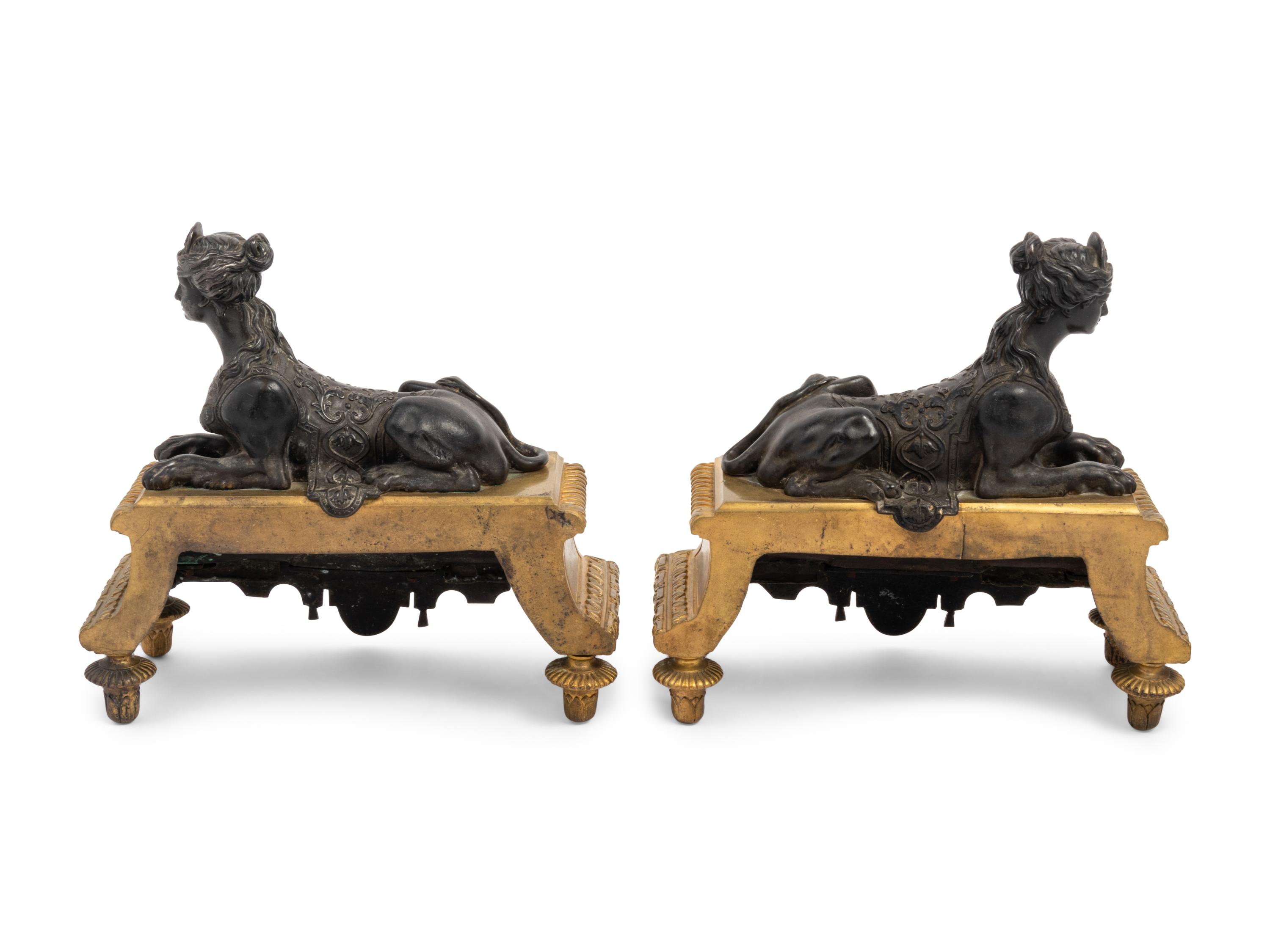 A Pair of Louis XVI Style Gilt and Patinated Bronze Chenets with Sphinxes