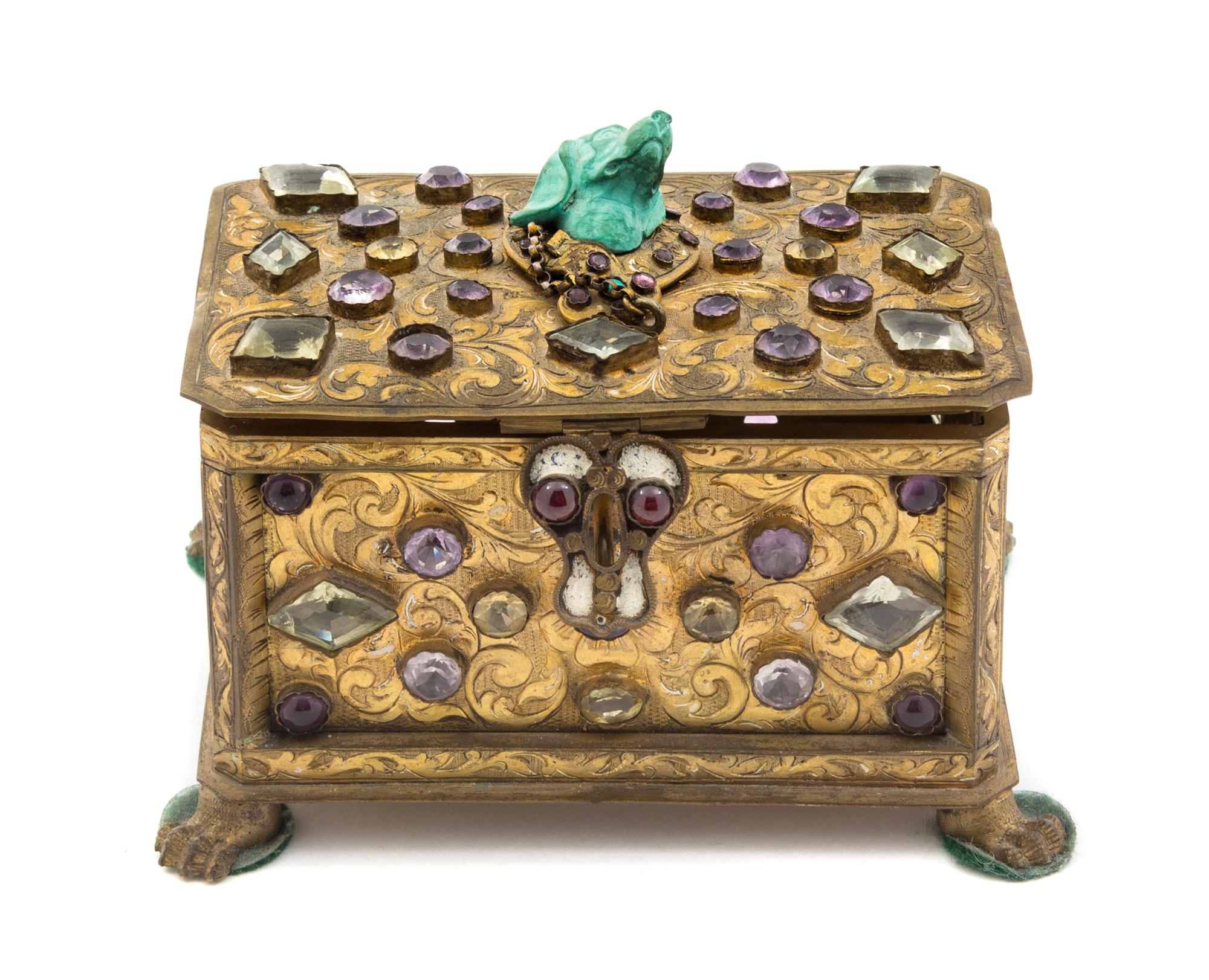 A Continental Silver-Gilt, Rock Crystal and Gem-Inset Box Height 3 x width 5 x depth 3 1/2 inches.