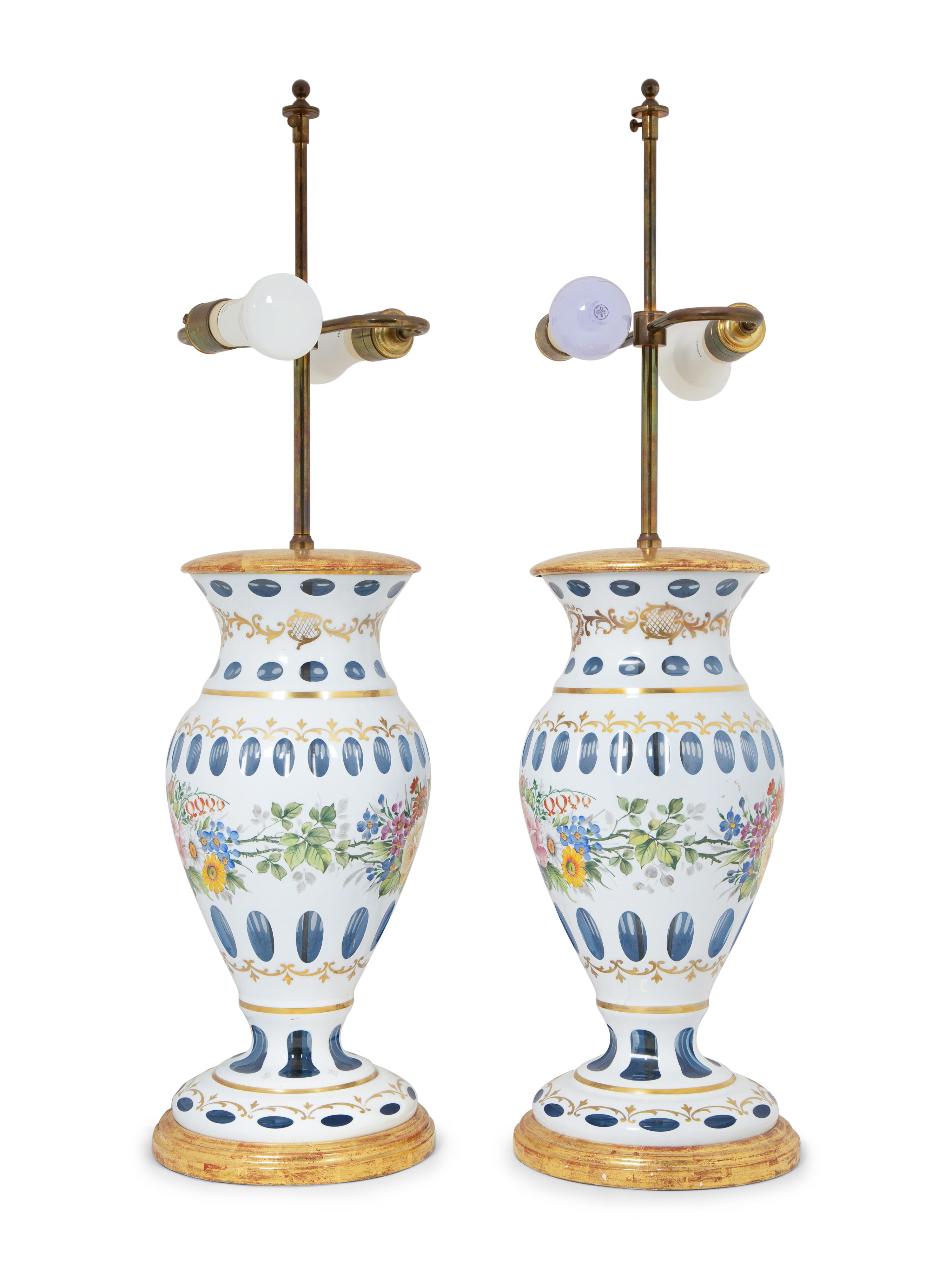 A Pair of Bohemian Enameled White Overlay Glass Baluster Vases