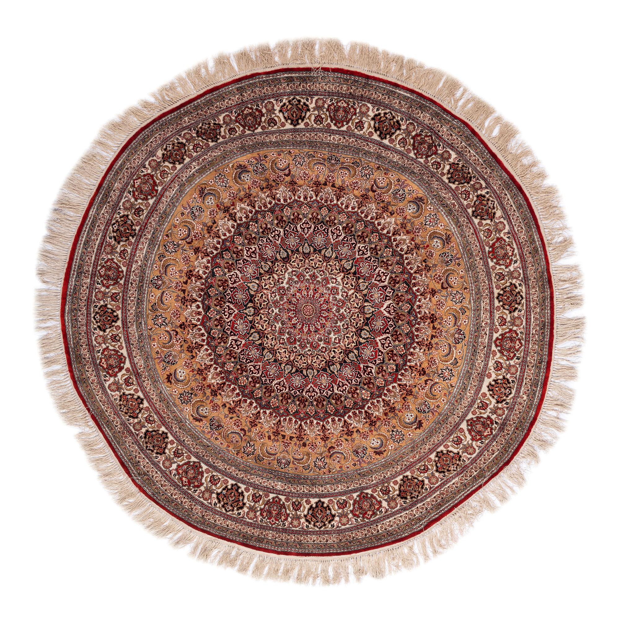 A Round Silk Rug