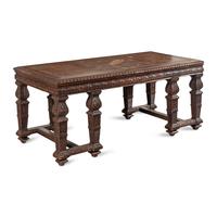 An Italian Carved Oak Writing Table