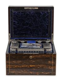 A Victorian Calamander Traveling Vanity Case with Silver-Mounted Accessories