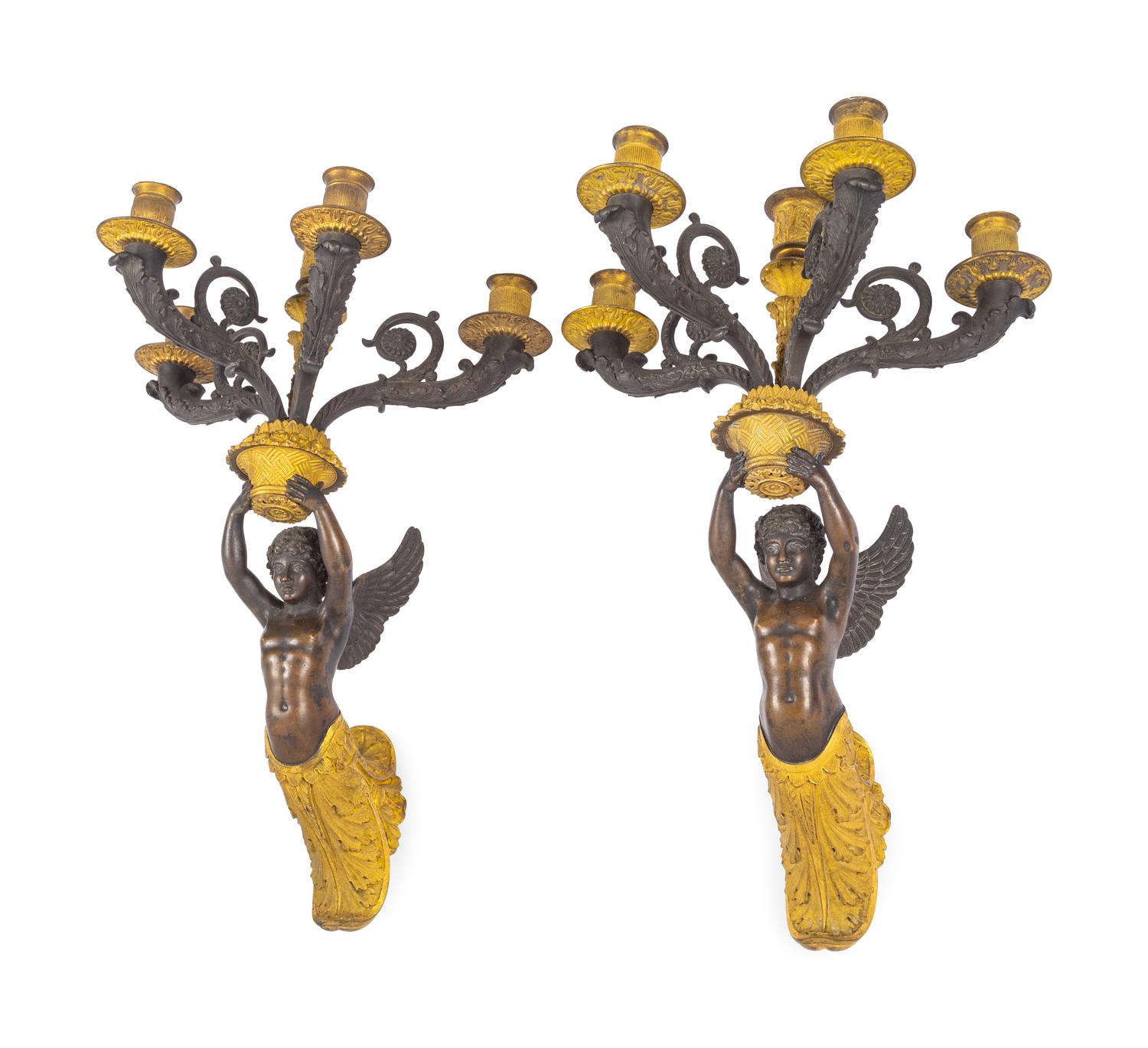 A Pair of Empire Style Gilt and Patinated Bronze Figural Five-Light Sconces