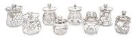 A Collection of Eight Silver Overlay Covered Jars Height of tallest 4 3/4 inches.