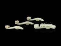 Four Chinese Celadon Jade 'Chilong' Belt Hooks