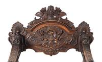 A Renaissance Revival Carved Walnut Savonarola Chair