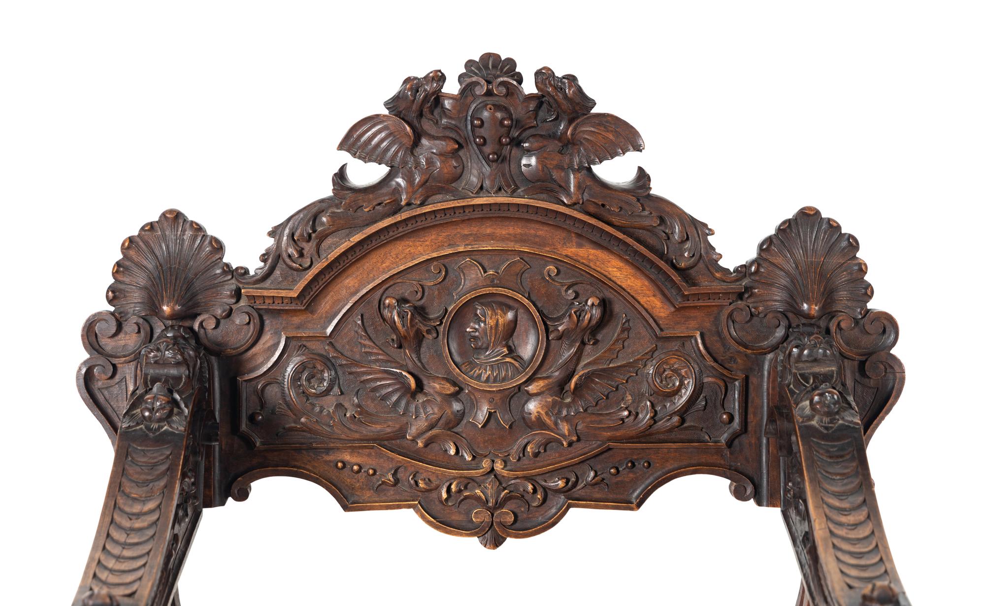 A Renaissance Revival Carved Walnut Savonarola Chair