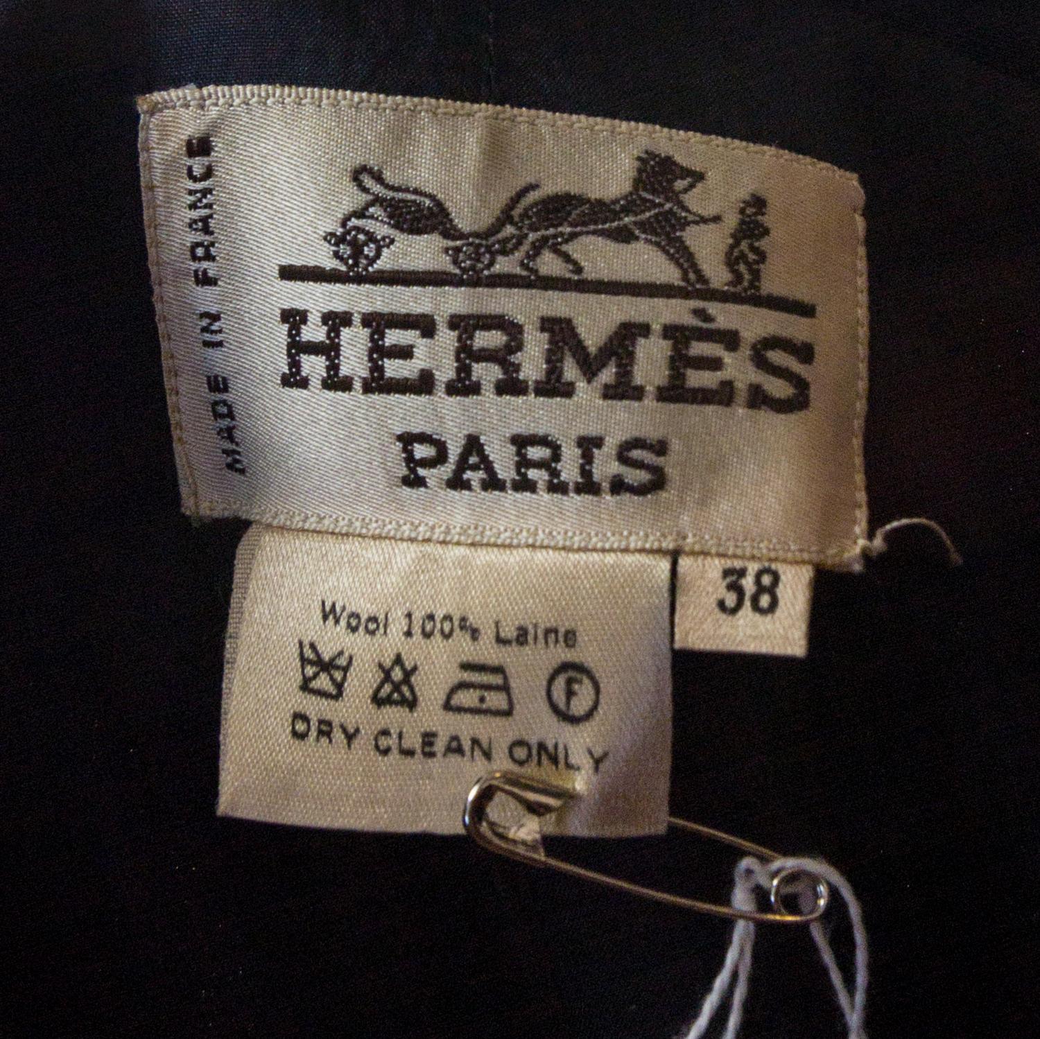 An Hermes Navy Wool Skirt Suit, Size 38.