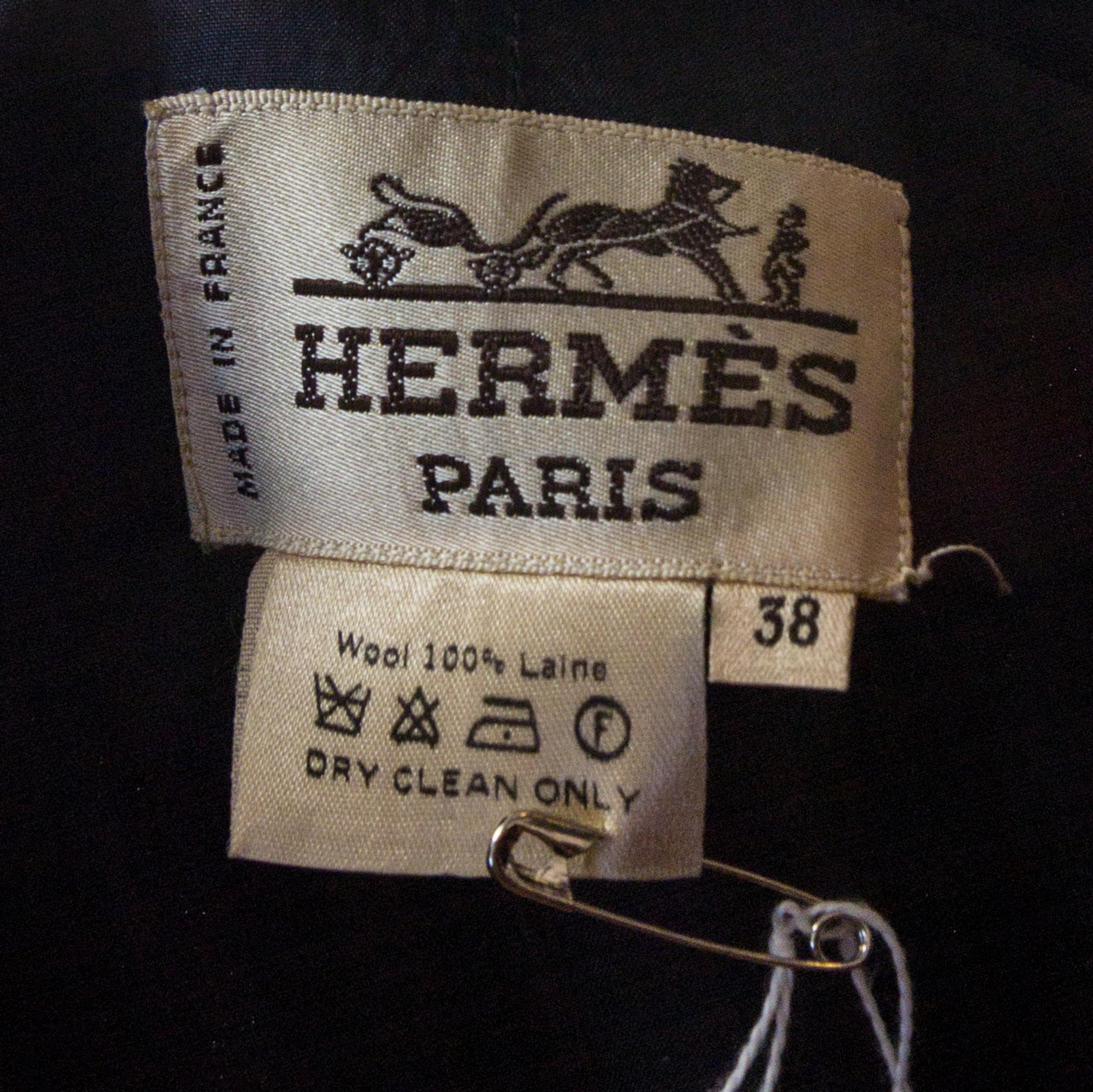 An Hermes Navy Wool Skirt Suit, Size 38.