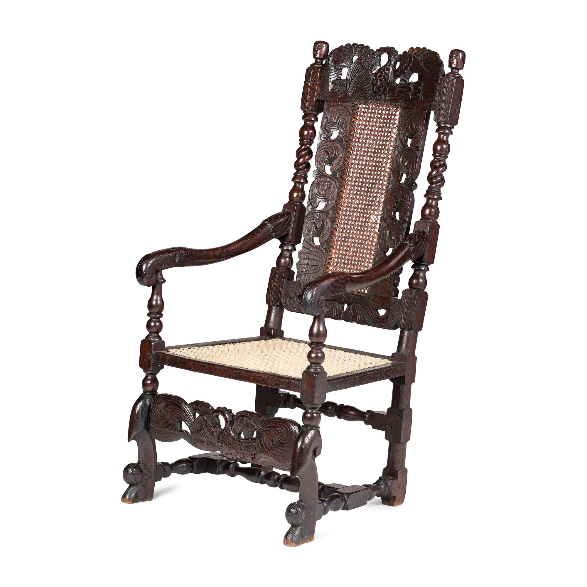 A William and Mary Swan-and-Leaf Carved and Cane Upholstered Oak Armchair