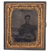 A group of items identified to Private William H. Shaver, Battery M, 2nd Pennsylvania Heavy Artillery, highlighted by war-date tintypes, CDVs, and army mess gear.