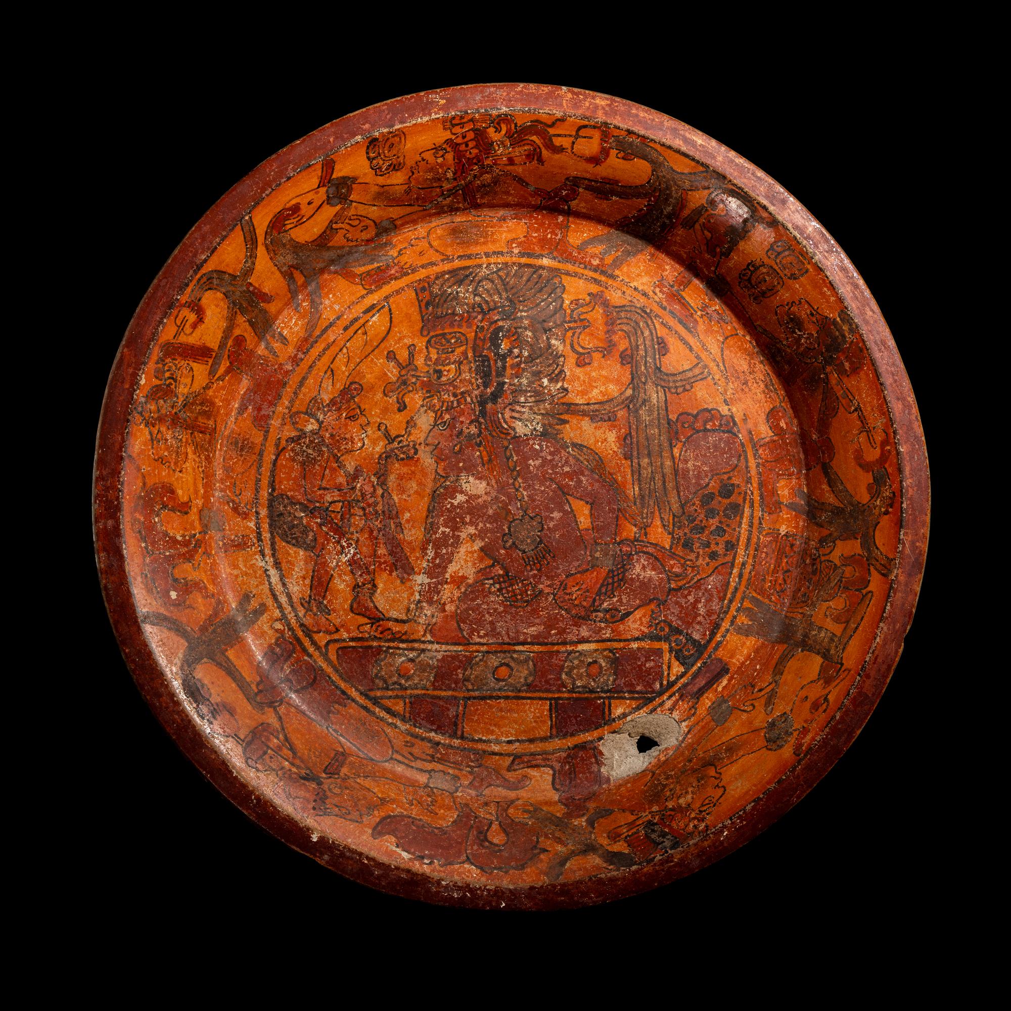 A Maya Polychrome Terracotta Tripod Plate with Gods and Glyphs