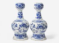 A Pair of Delft Blue and White Bottle Vases