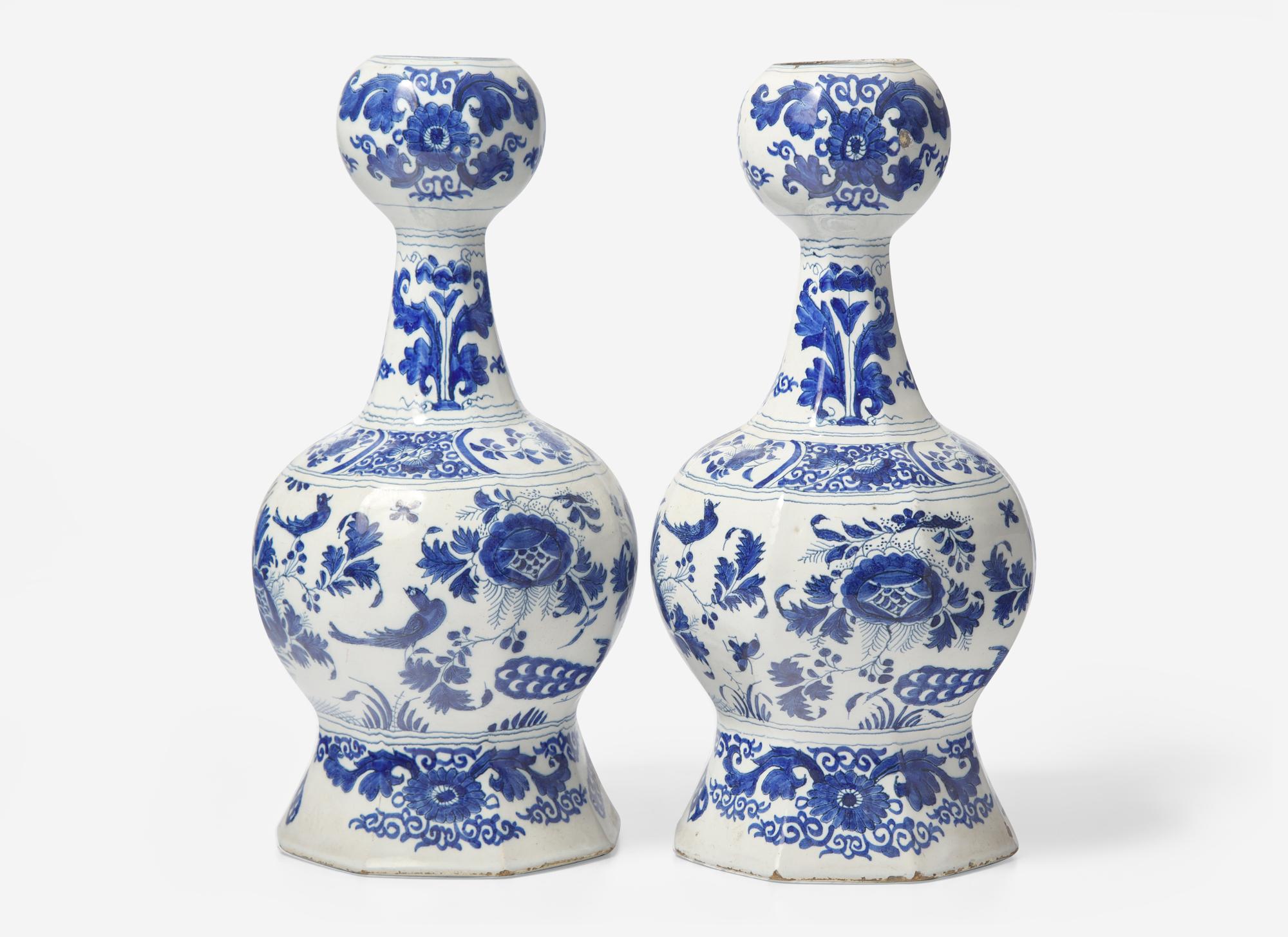 A Pair of Delft Blue and White Bottle Vases