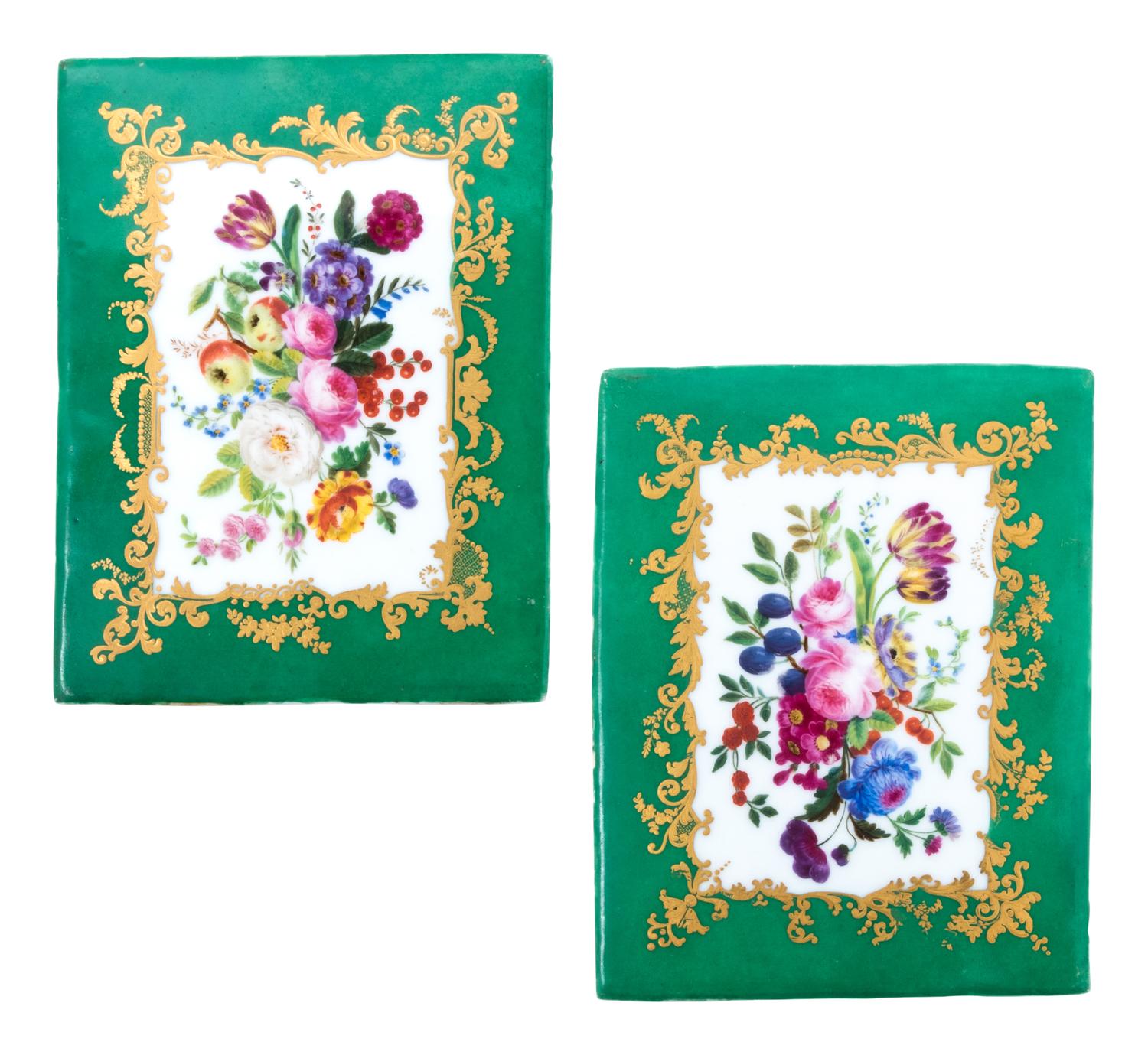 A Pair of Sèvres Style Painted and Parcel Gilt Green-Ground Porcelain Floral Panels