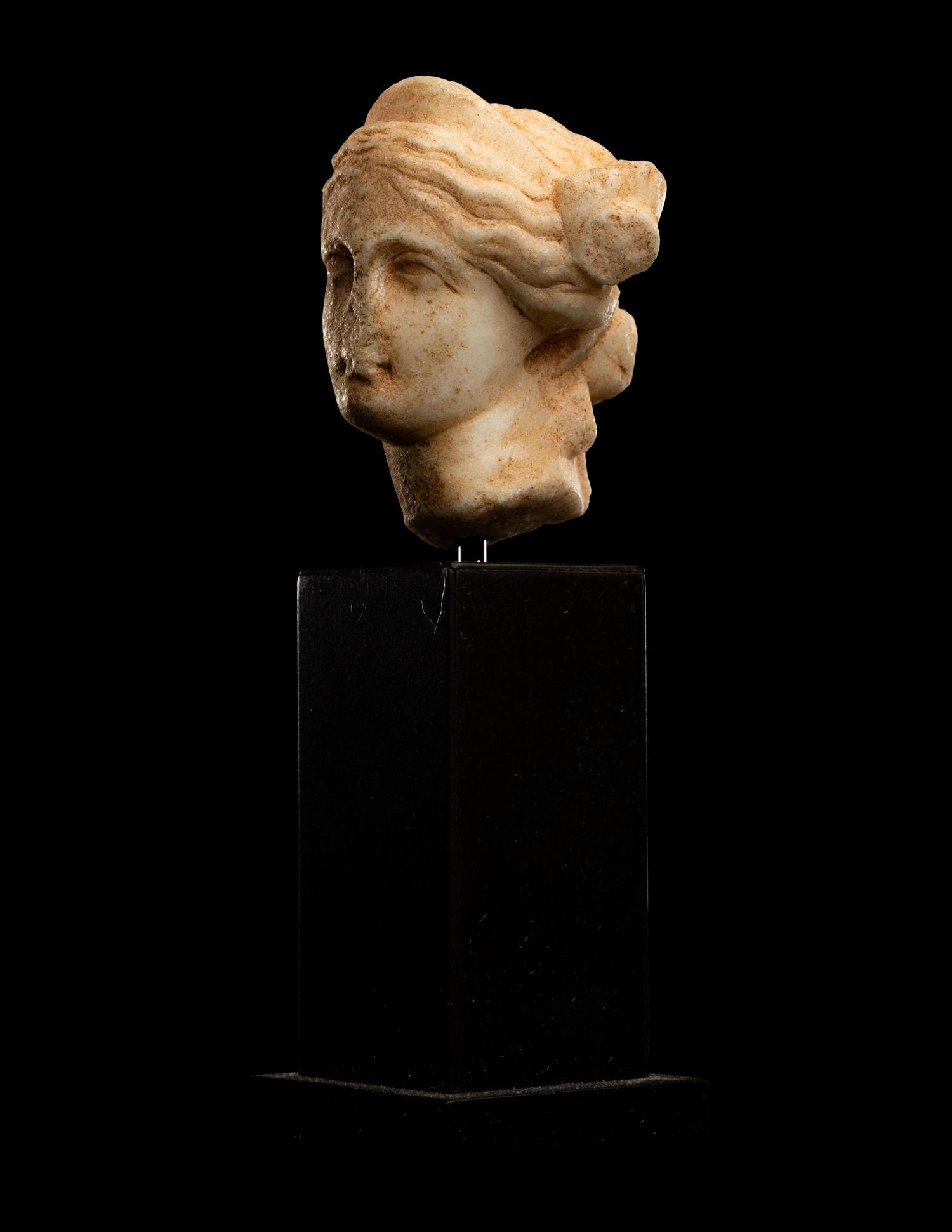 A Roman Marble Head of a Woman