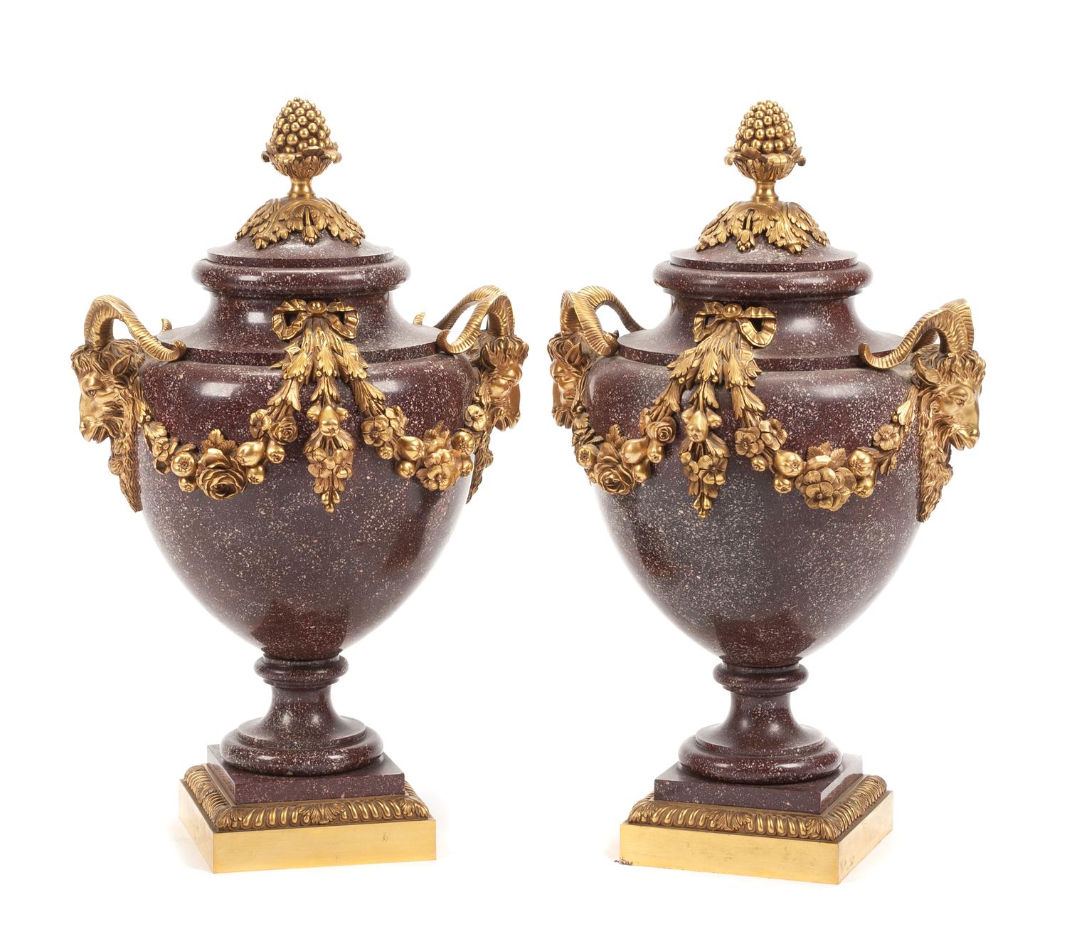 A Pair of French Gilt Bronze Mounted Porphyry Urns Height 23 inches. — 19TH CENTURY