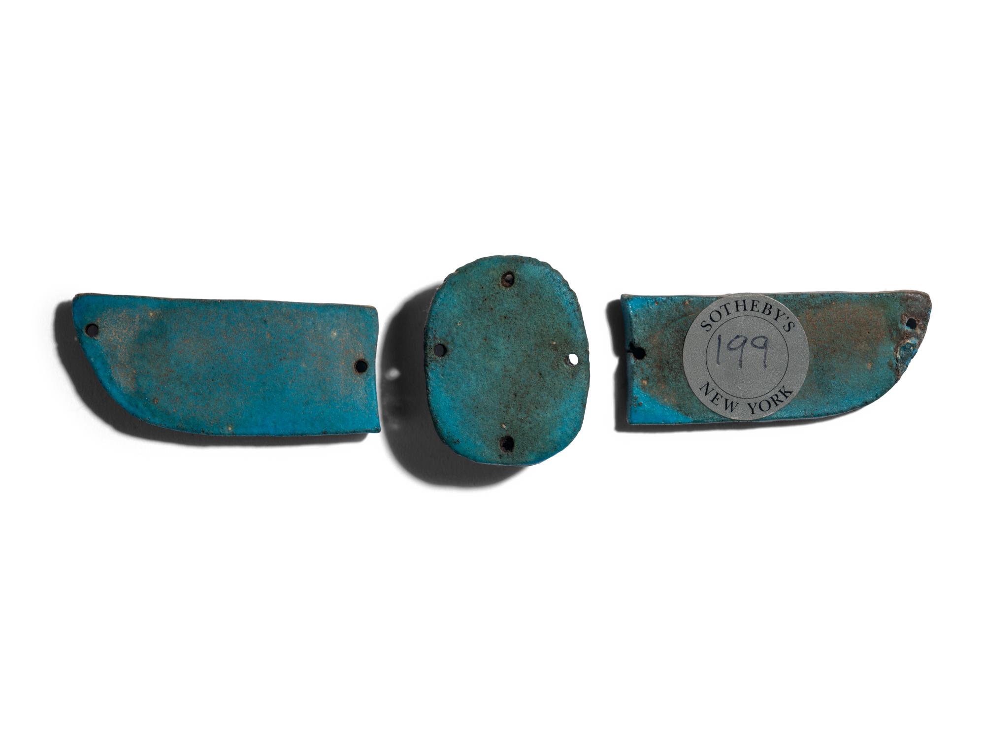 An Egyptian Faience Winged Scarab