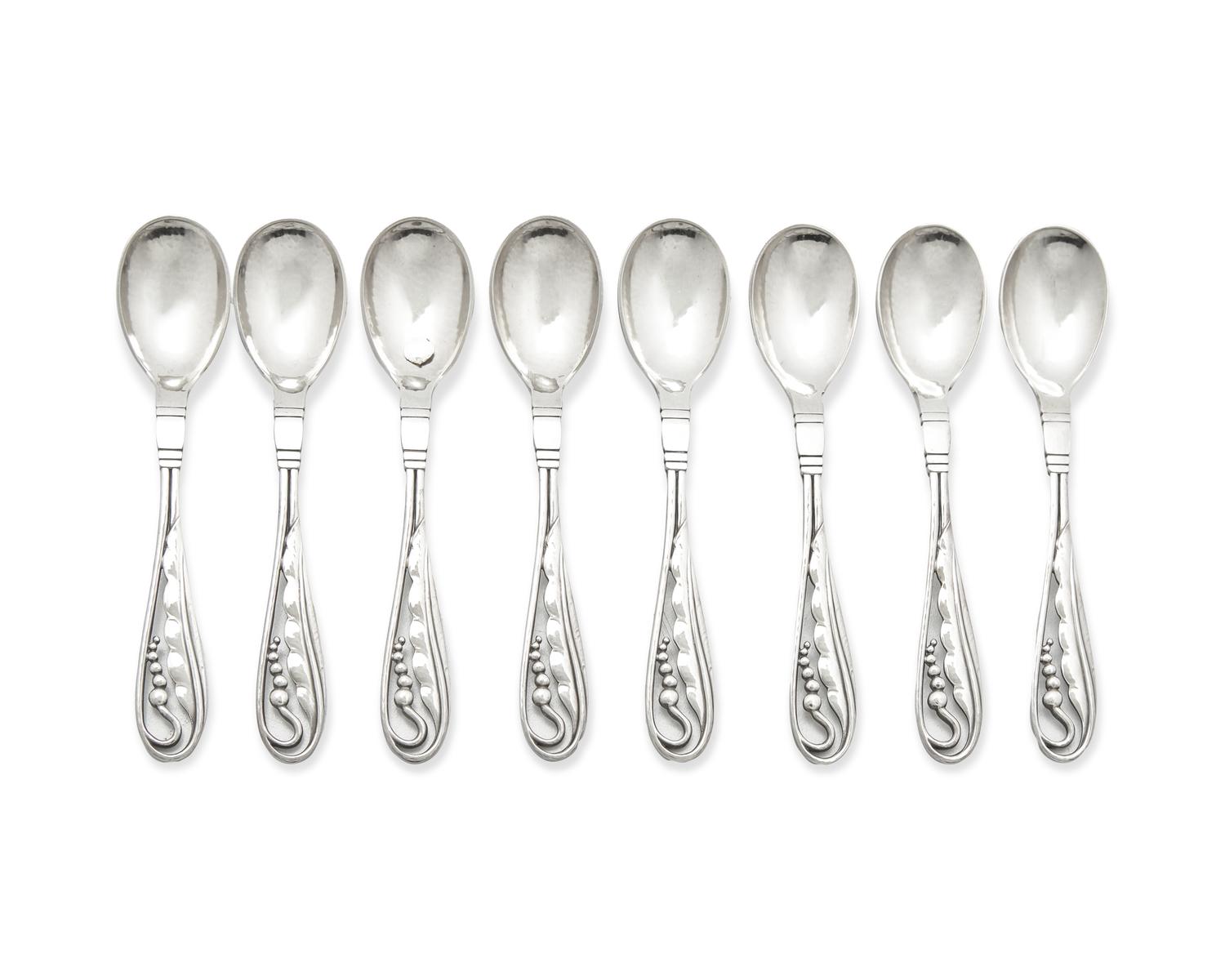 A Set of Eight Georg Jensen Silver Blossom Coffee Spoons