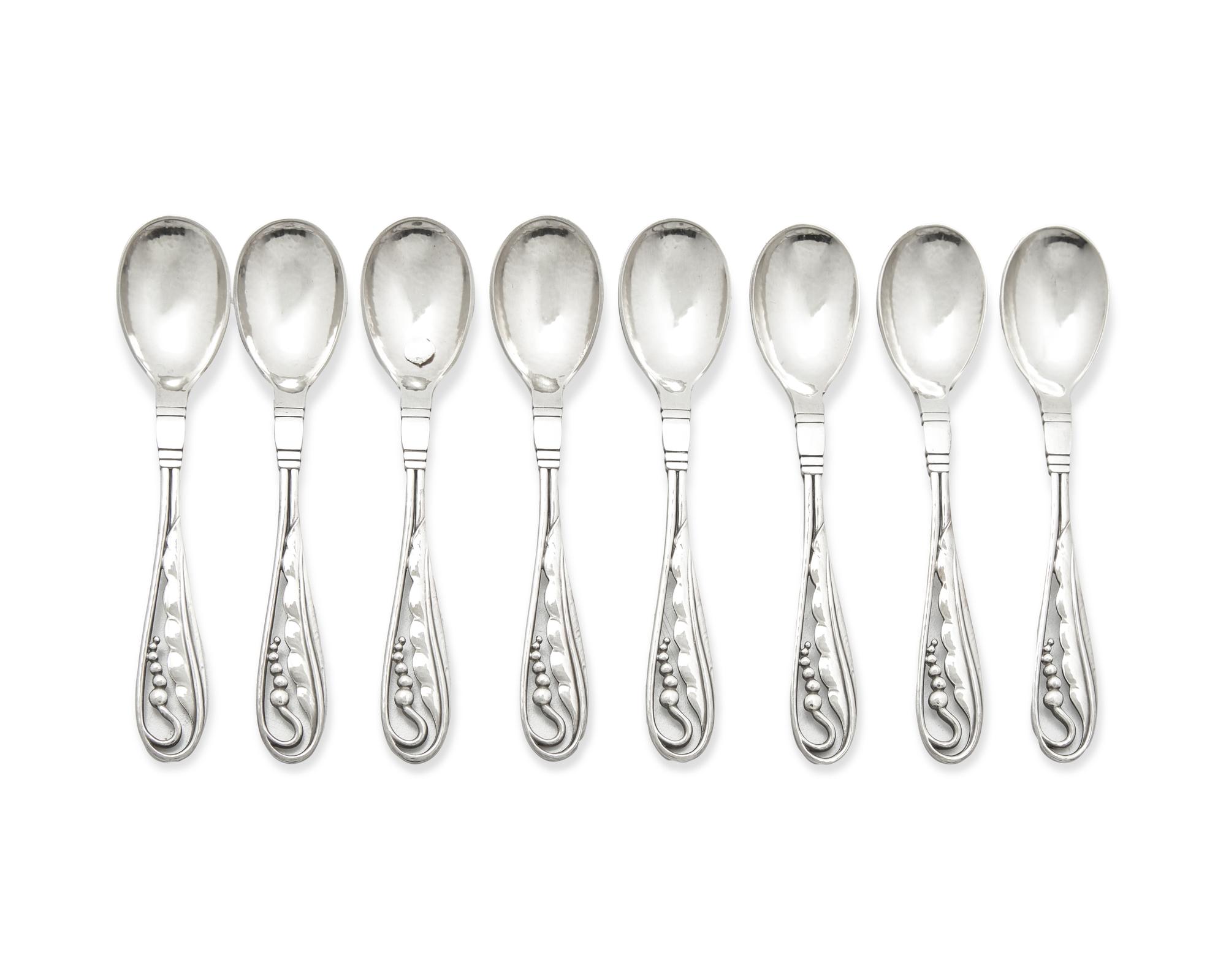 A Set of Eight Georg Jensen Silver Blossom Coffee Spoons