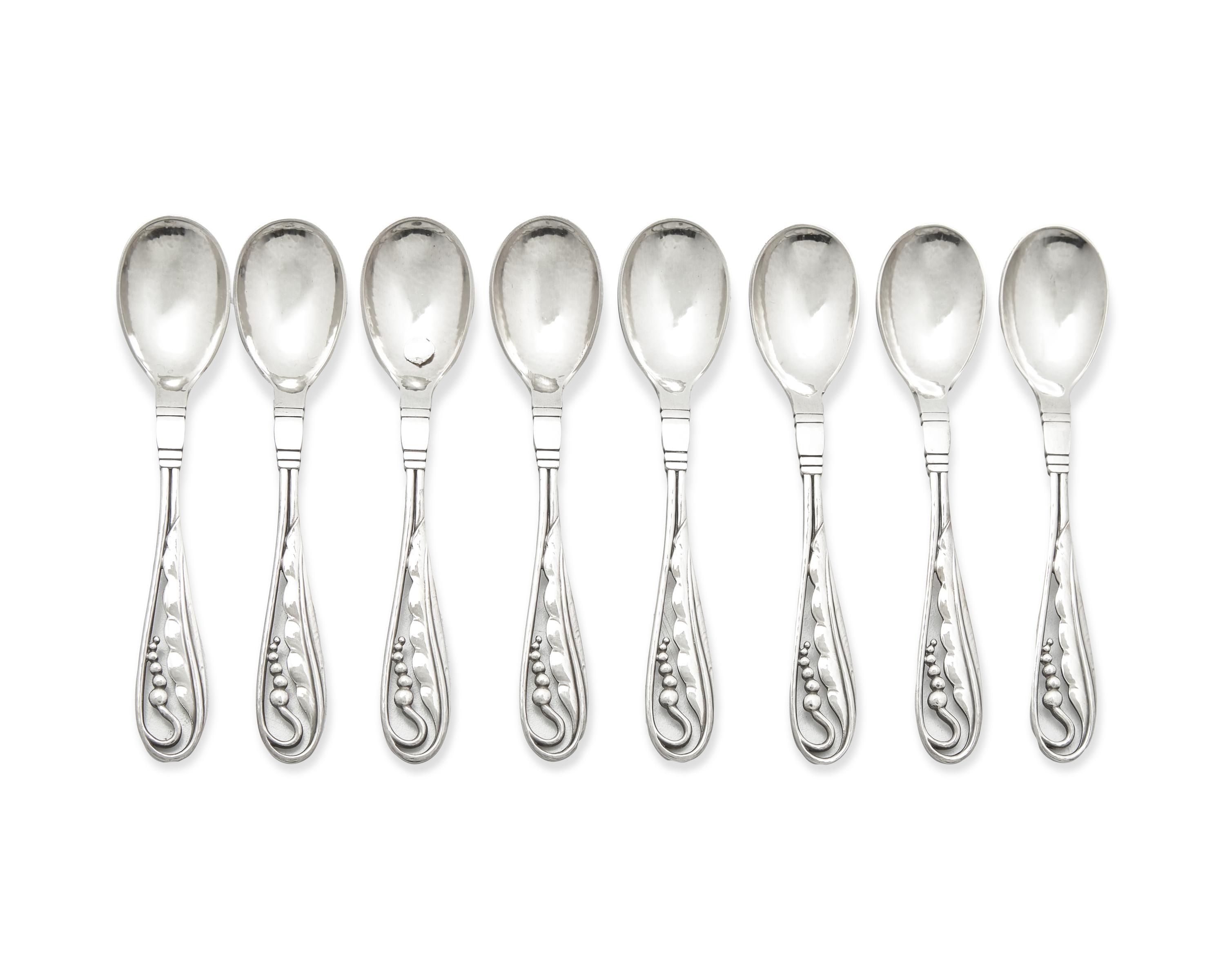 A Set of Eight Georg Jensen Silver Blossom Coffee Spoons