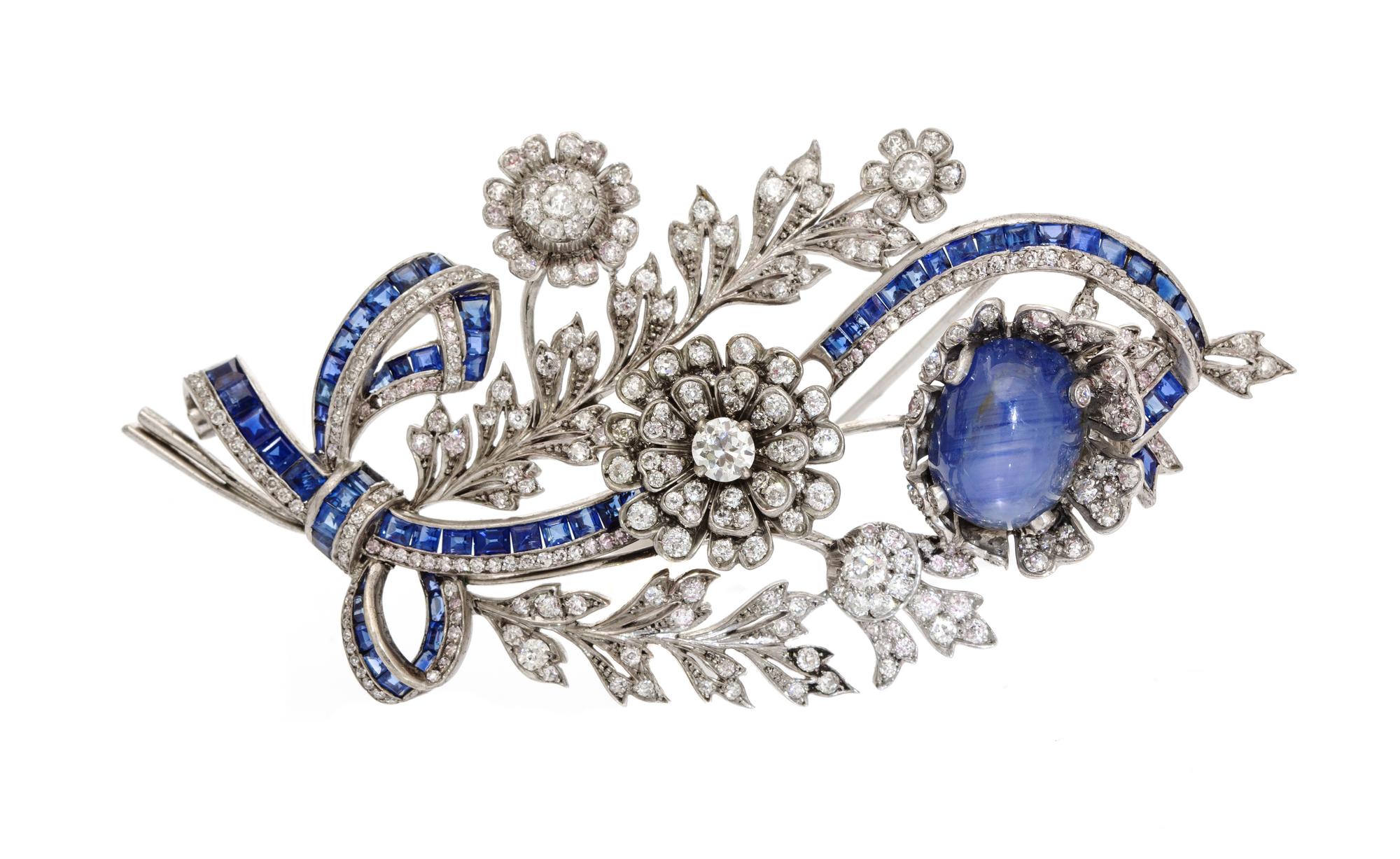 A White Gold, Star Sapphire, Sapphire and Diamond En Tremblant Brooch, 23.80 dwts.