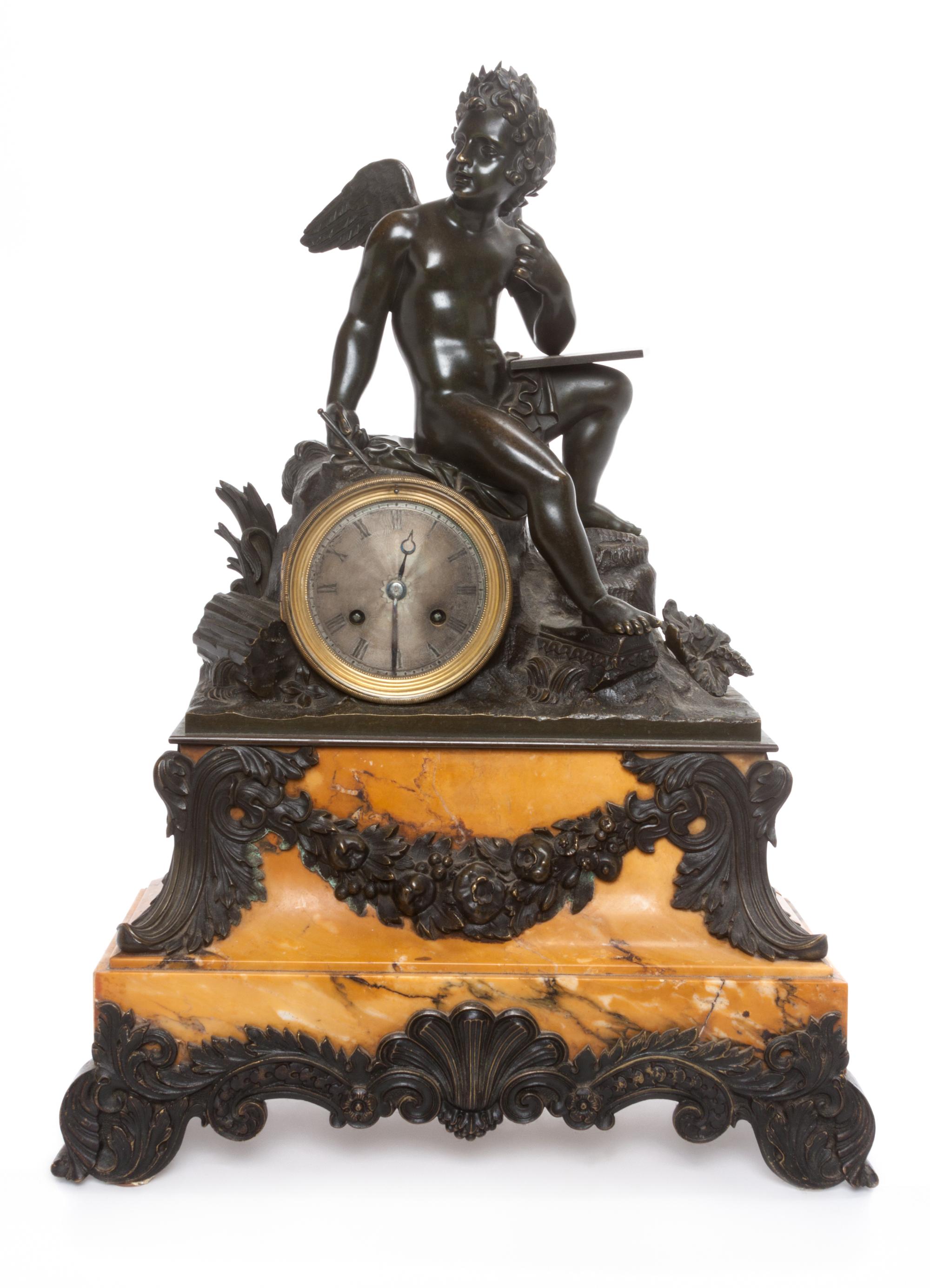 A Continental Bronze and Marble Figural Clock Height 19 3/4 inches.