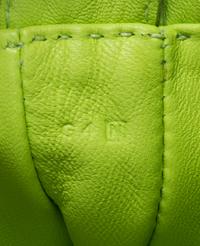 An Hermes Kiwi Agneau Clou de Selle Pouch, 6" x 9" x 1".