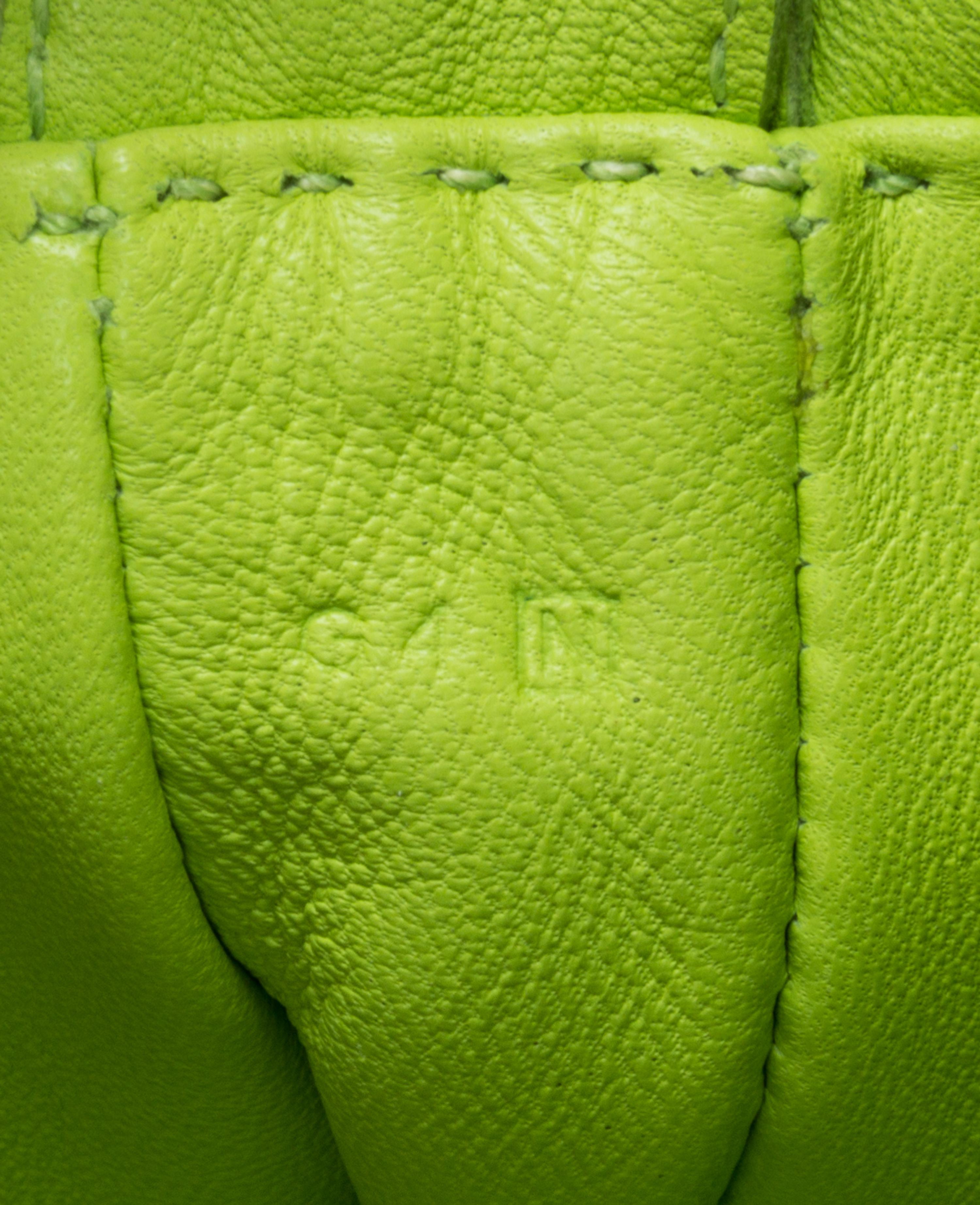 An Hermes Kiwi Agneau Clou de Selle Pouch, 6" x 9" x 1".