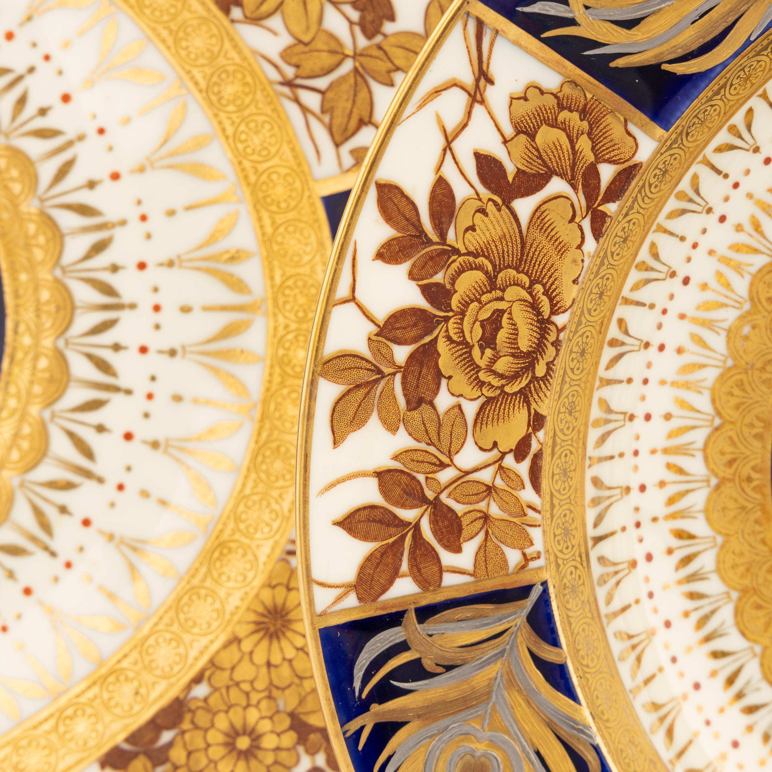 An Aesthetic Movement Parcel-Gilt Porcelain Table Service
