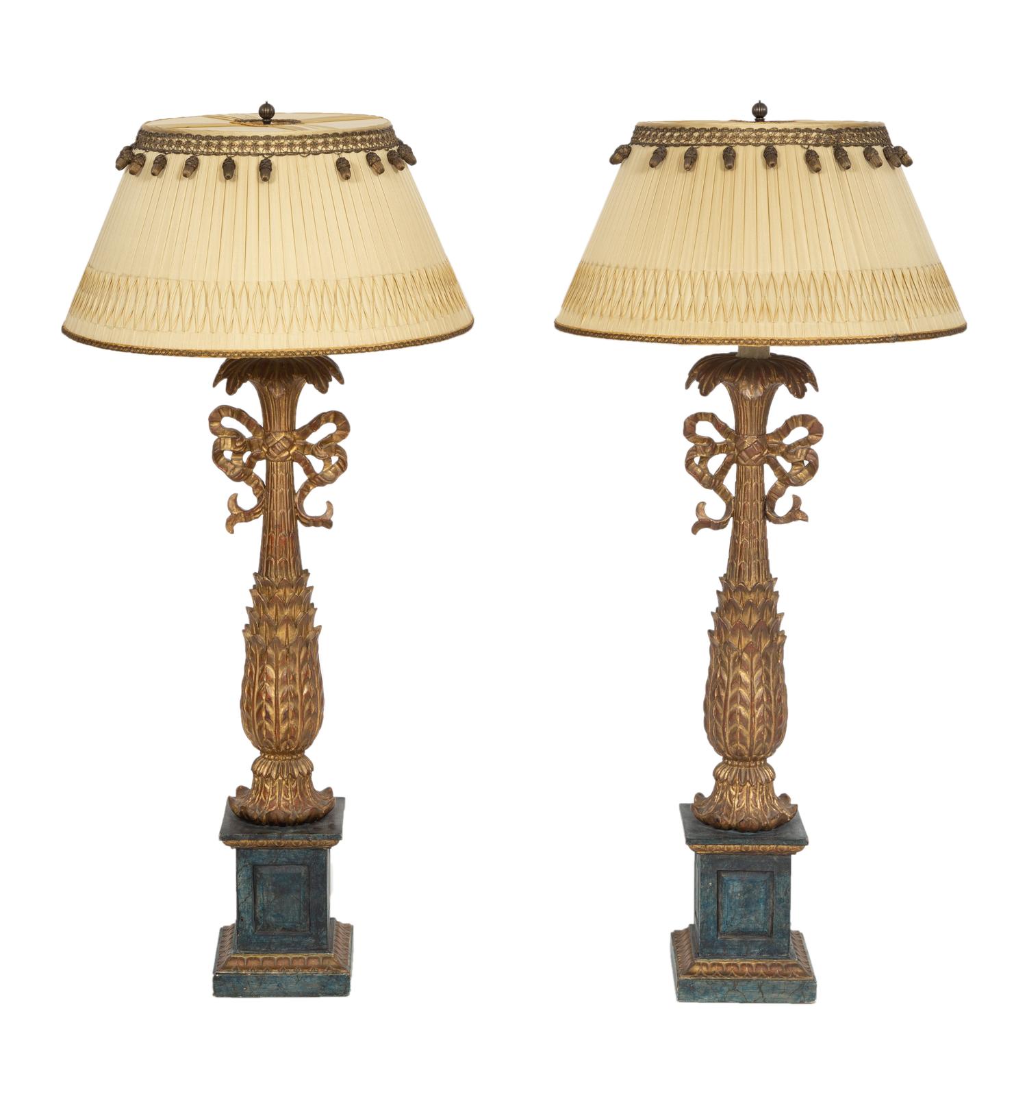 A Pair of XVI Style Carved Giltwood Lamps on Ebonized Pedestal Bases