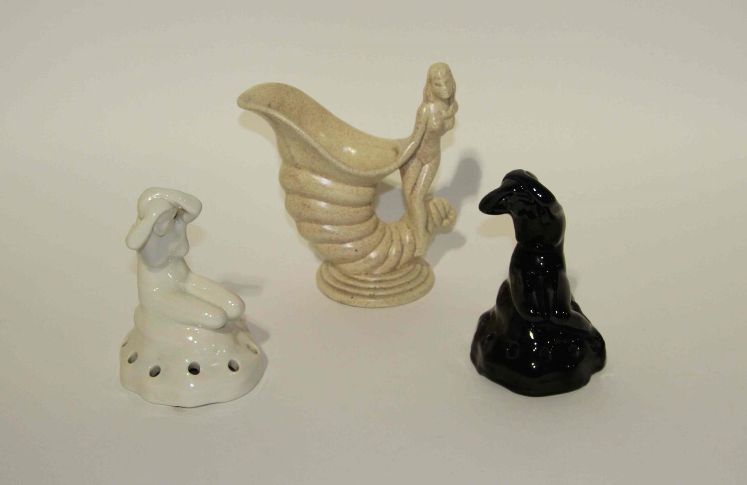 Two Haeger Pottery Figural Flower Frogs Height of tallest 10 1/4 inches.