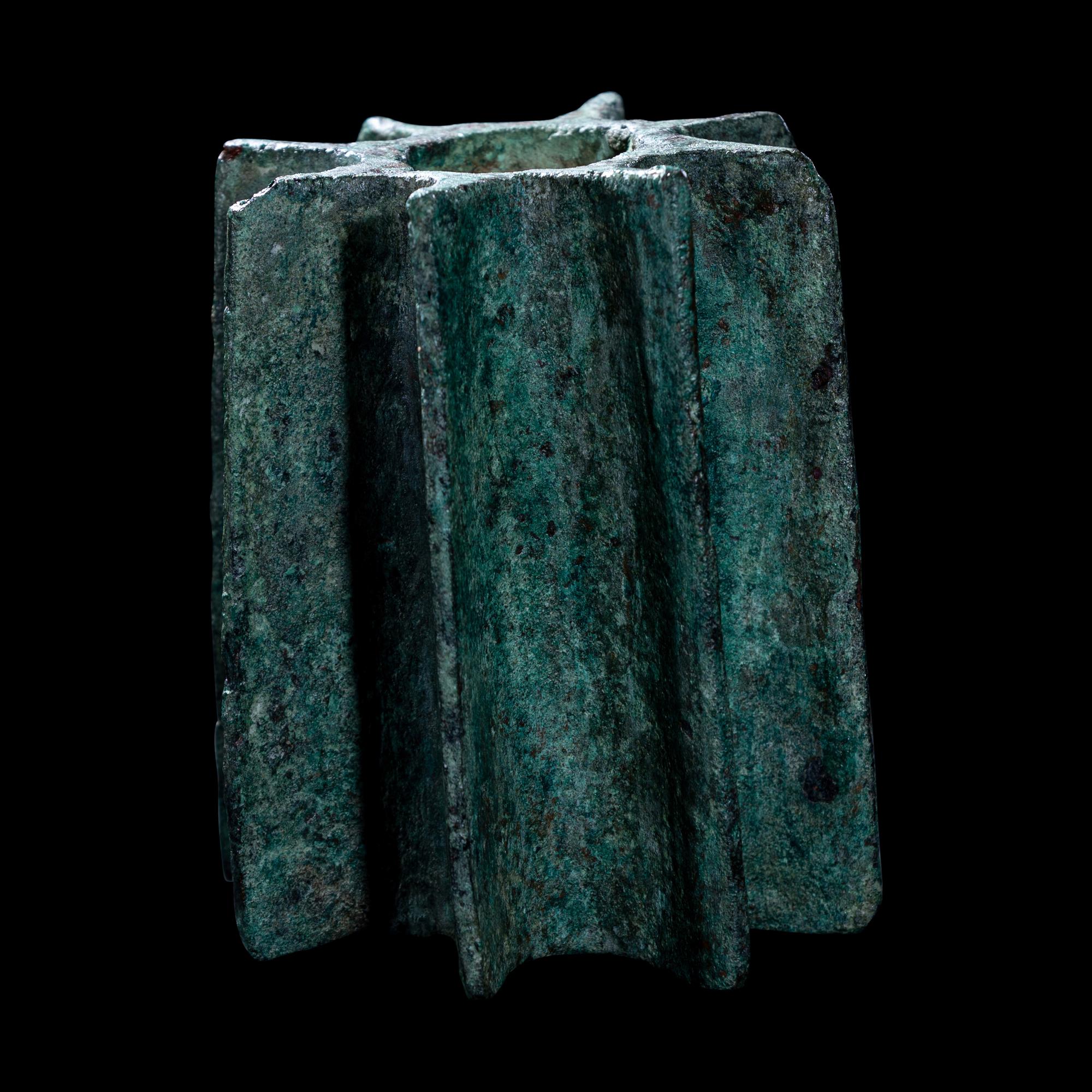 A Viscus Bronze Fluted Mace Head