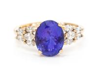 A 14 Karat Yellow Gold, Tanzanite and Diamond Ring, 3.90 dwts.