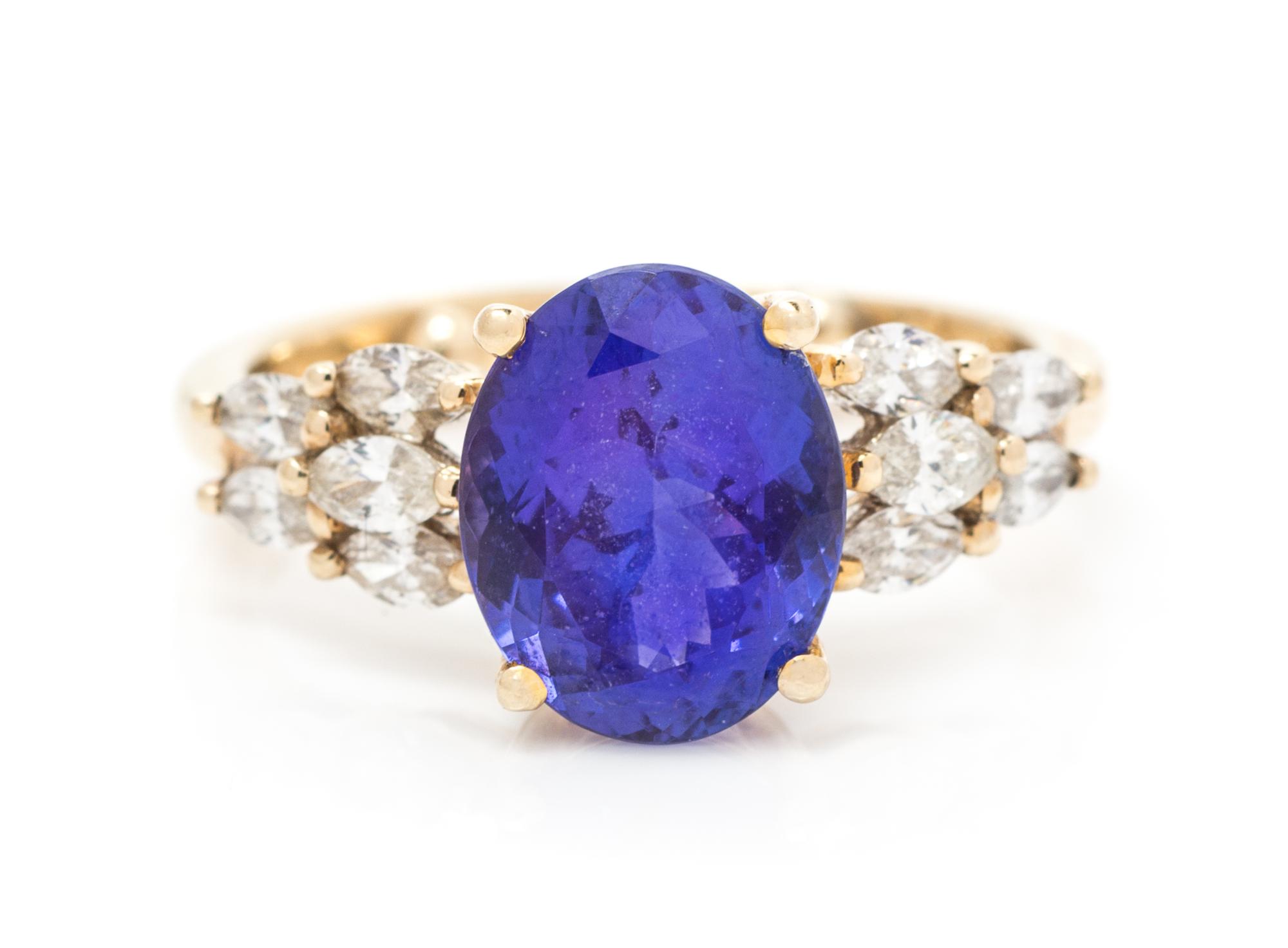 A 14 Karat Yellow Gold, Tanzanite and Diamond Ring, 3.90 dwts.