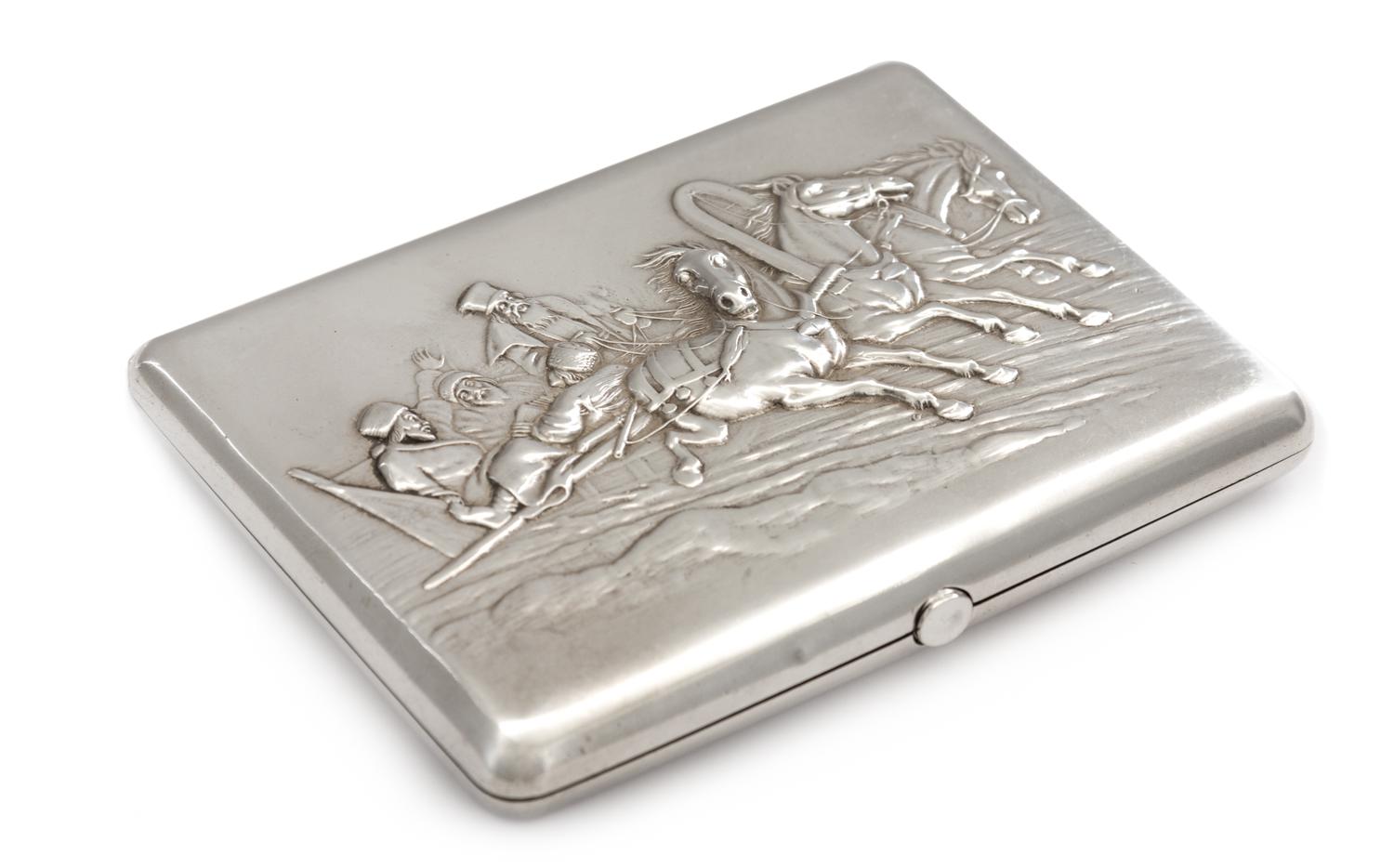 A Russian Silver Cigarette Case, Mark of Ivan Kaltikov, Moscow, the lid with a repousse decorated troika scene, the underside and inter