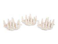 A Set of Three Contemporary Bisque Porcelain Candelabra