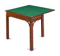 A George III Mahogany Blind Fret Carved Flip-Top Table