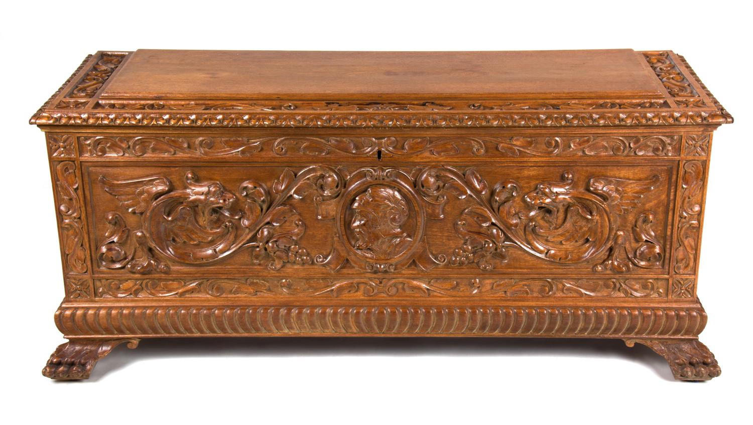 A Continental Carved Walnut Blanket Chest Height 21 1/2 x width 47 3/4 x depth 17 inches. — 20TH CENTURY