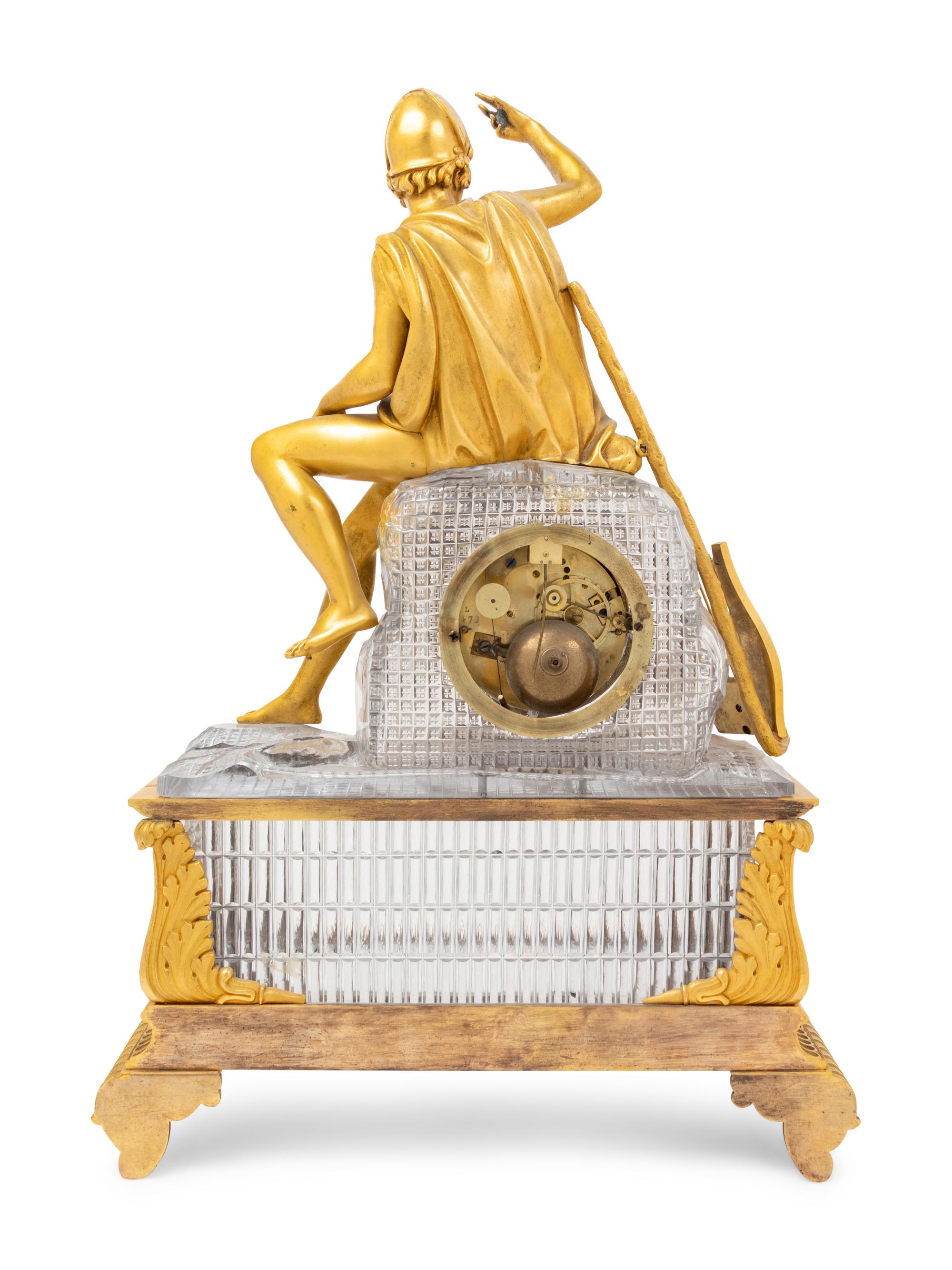 An Empire Style Gilt Bronze and Cut Glass Figural Mantel Clock
