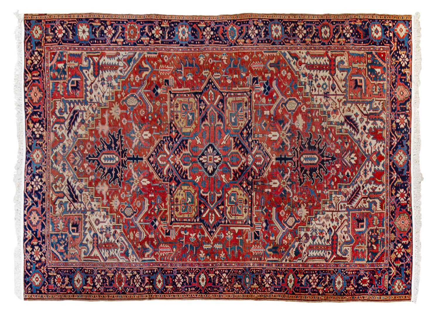 A Heriz Wool Rug 10 feet 7 inches x 8 feet 3 inches. — 20TH CENTURY