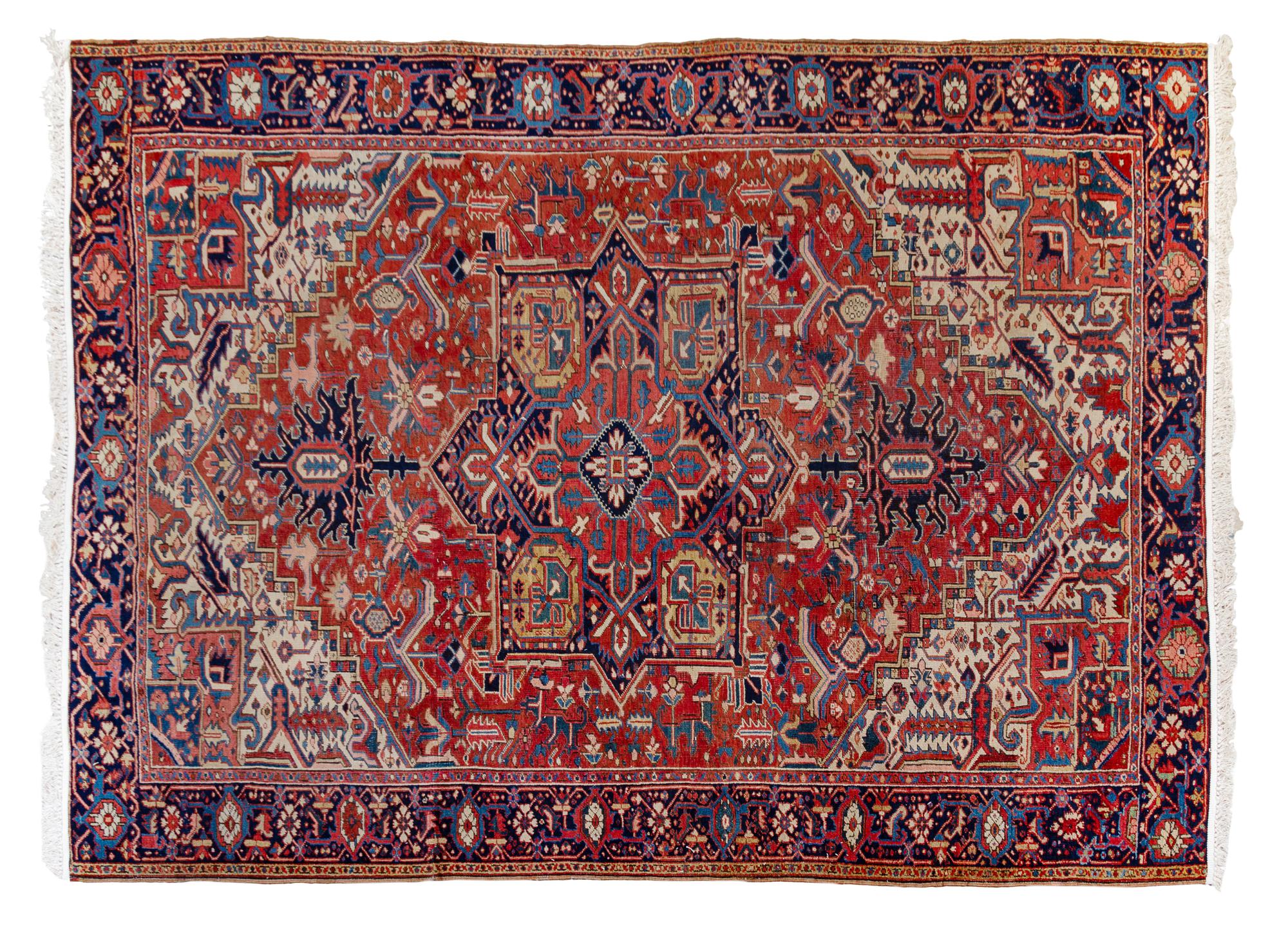 A Heriz Wool Rug 10 feet 7 inches x 8 feet 3 inches. — 20TH CENTURY