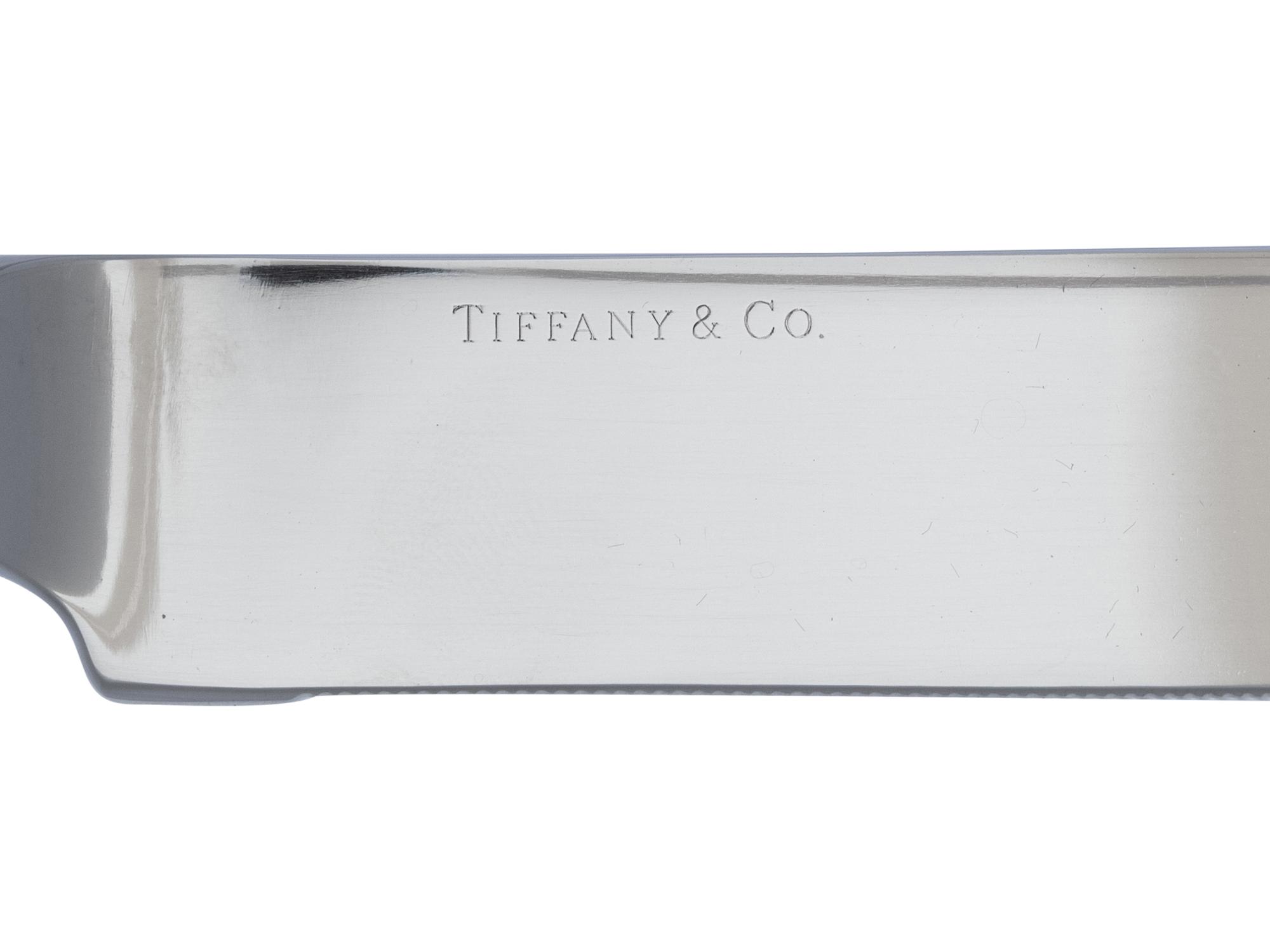 A Tiffany and Co. Silver Chrysanthemum Cake Knife and Server