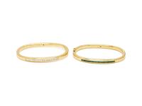 PAIR OF YELLOW GOLD AND GEMSTONE BANGLE BRACELETS