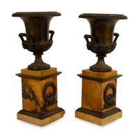 A Pair of French Bronze Urns on Marble Bases — 19TH/20TH CENTURY