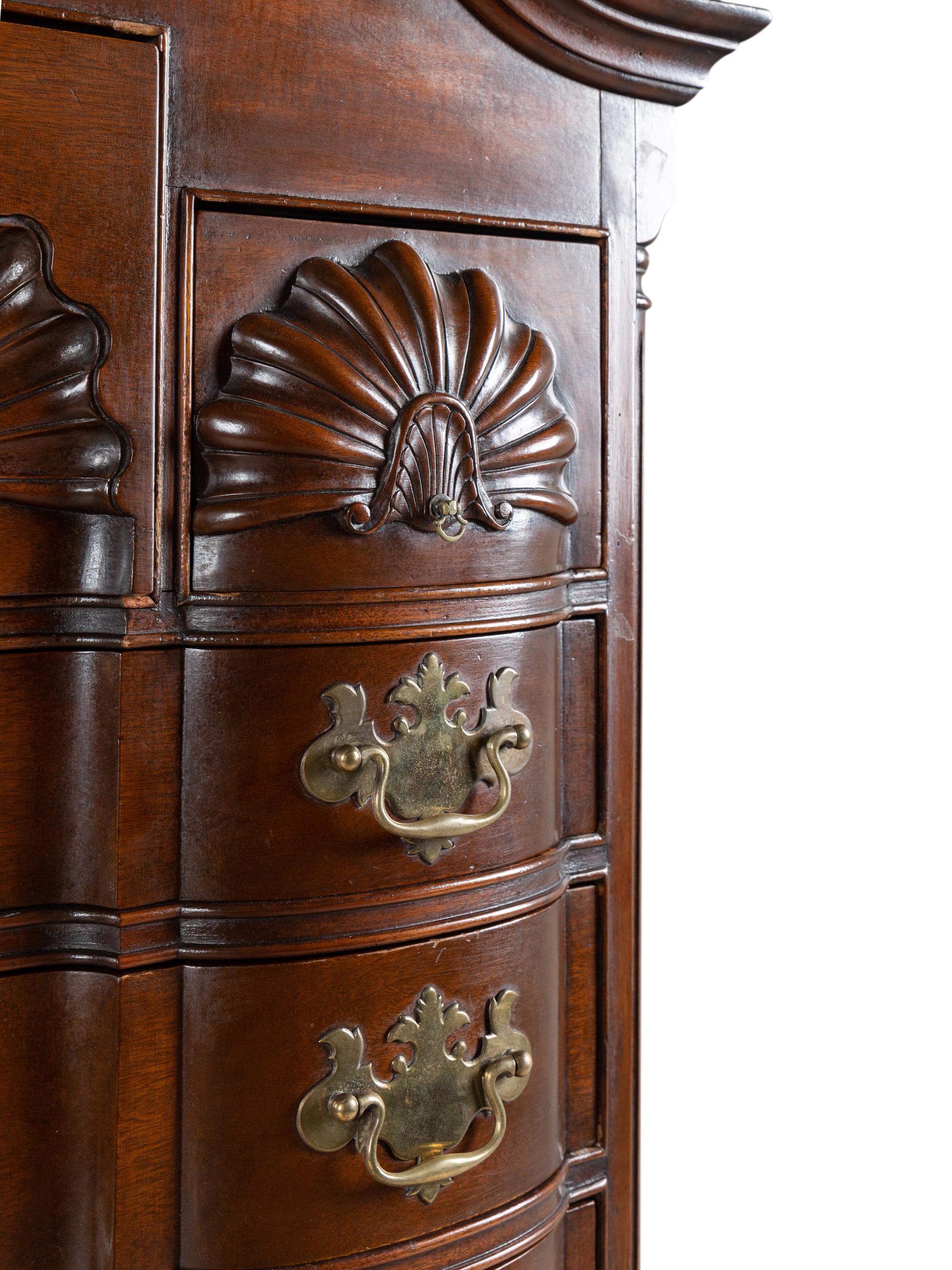 A Chippendale Style Shell and Rosette Carved Mahogany Block Front Chest-On-Chest